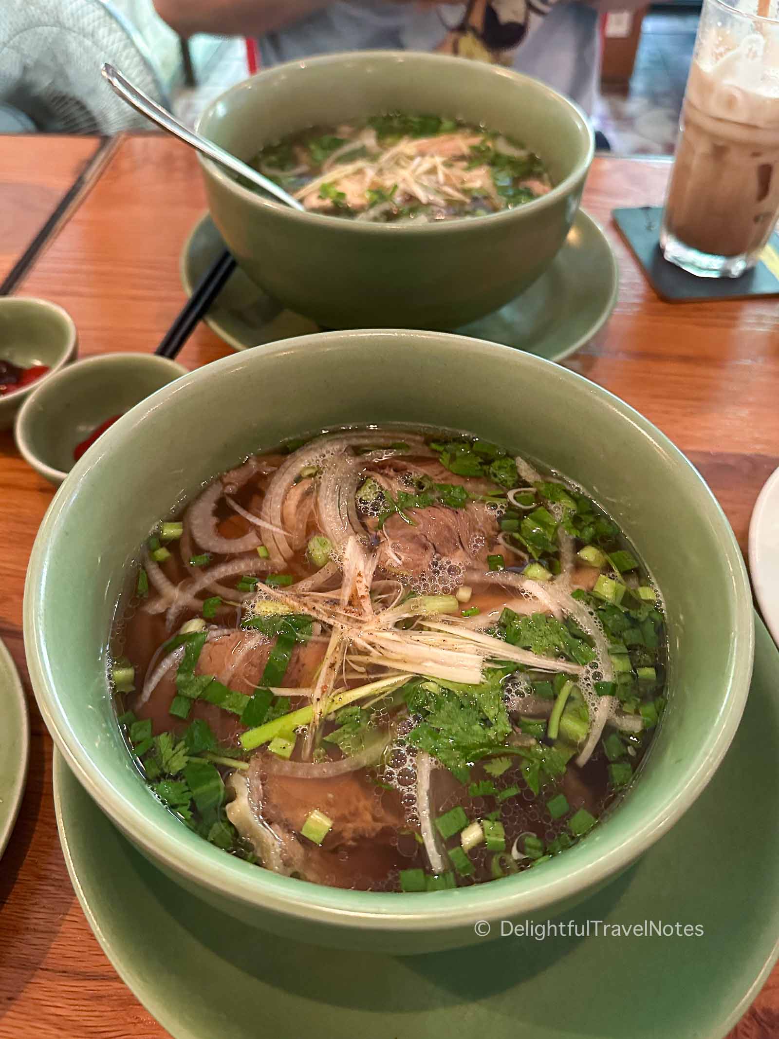 a bowl of beef pho noodle soup at Propaganda restaurant in Ho Chi Minh city