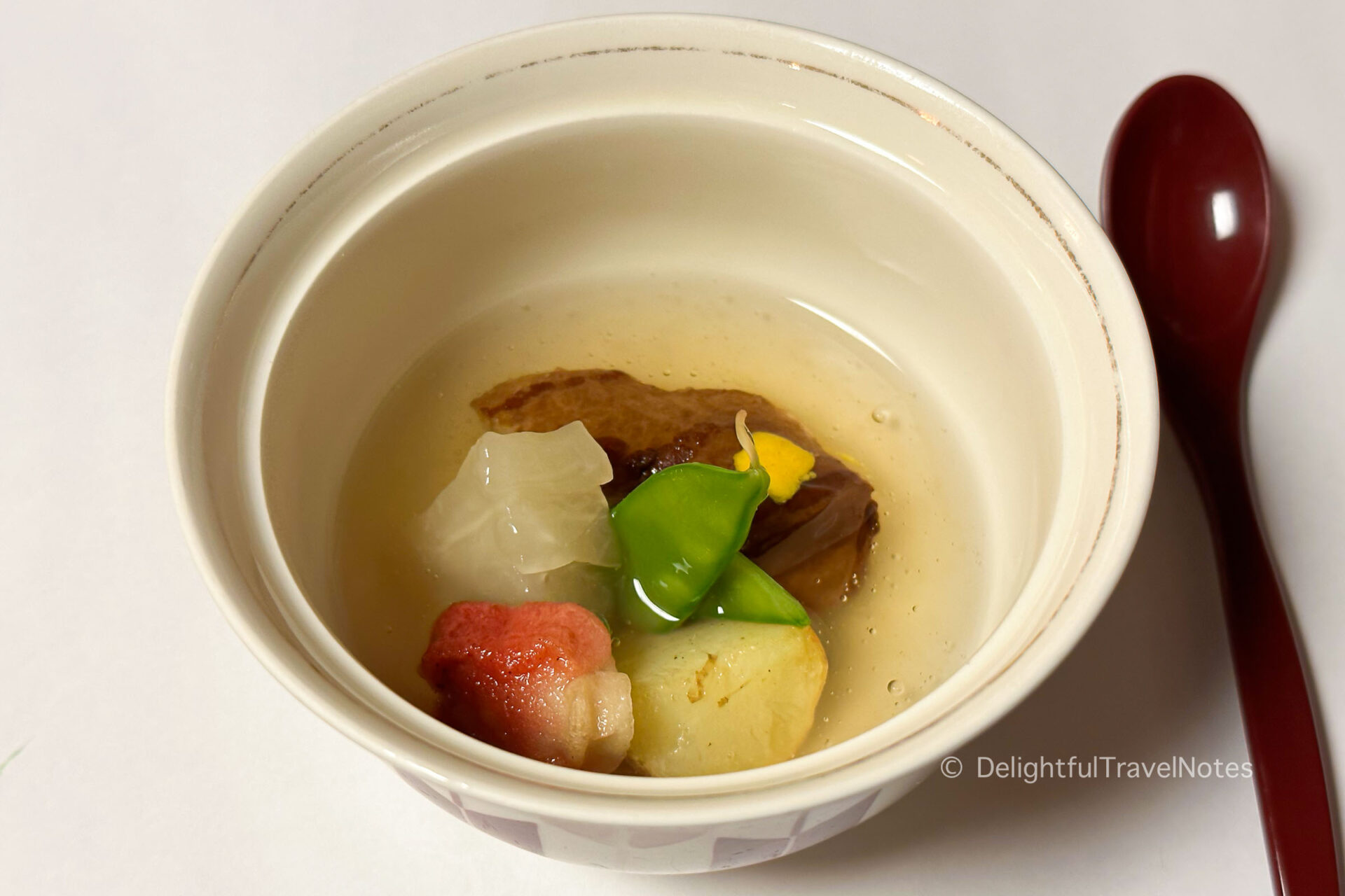a bowl of baised pork belly in the sixth course at Hanasaki Manjiro restaurant, Kyoto.