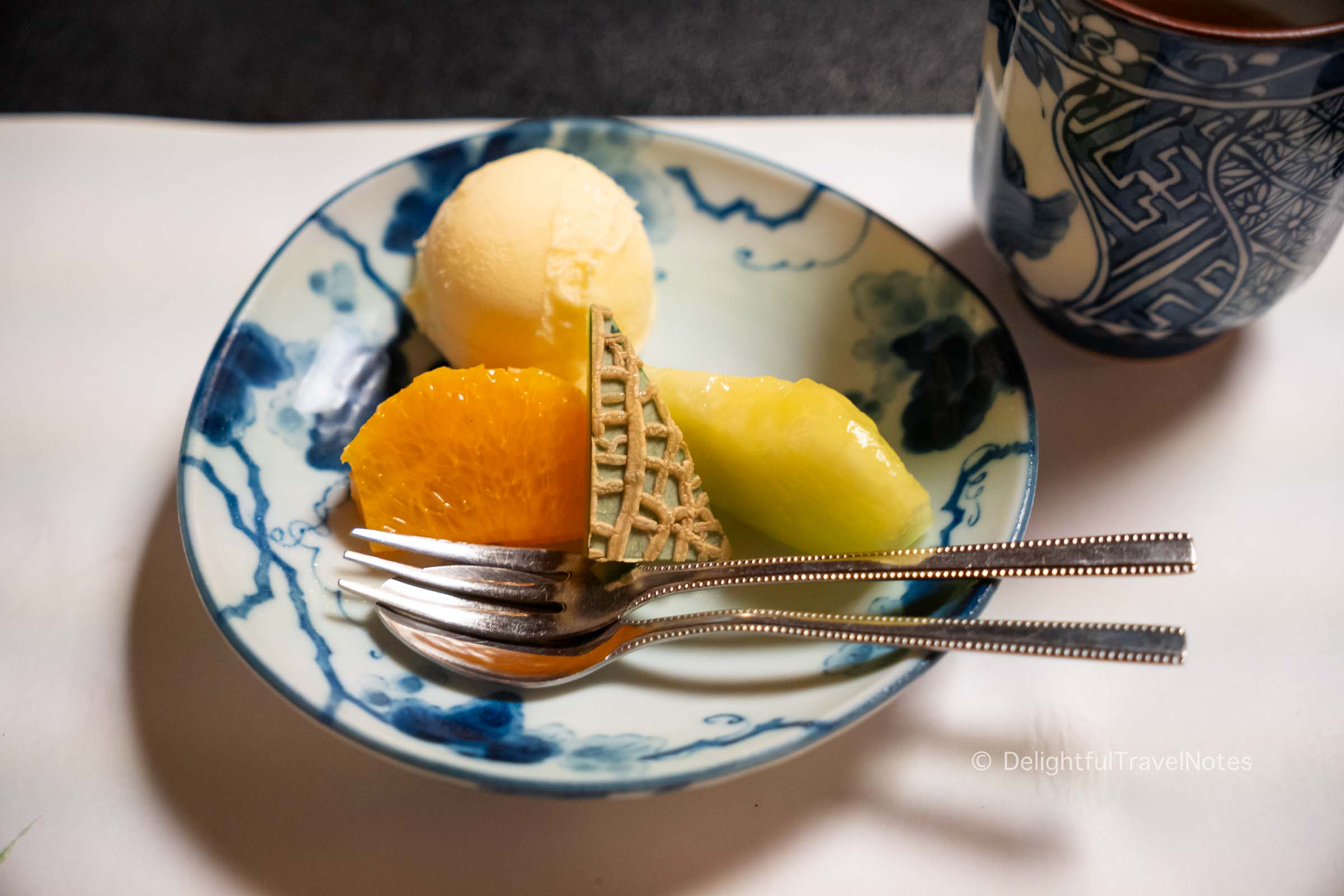 a plate of ice cream and fruits for desserts in Hanasaki Manjiro kaiseki dinner in Kyoto.