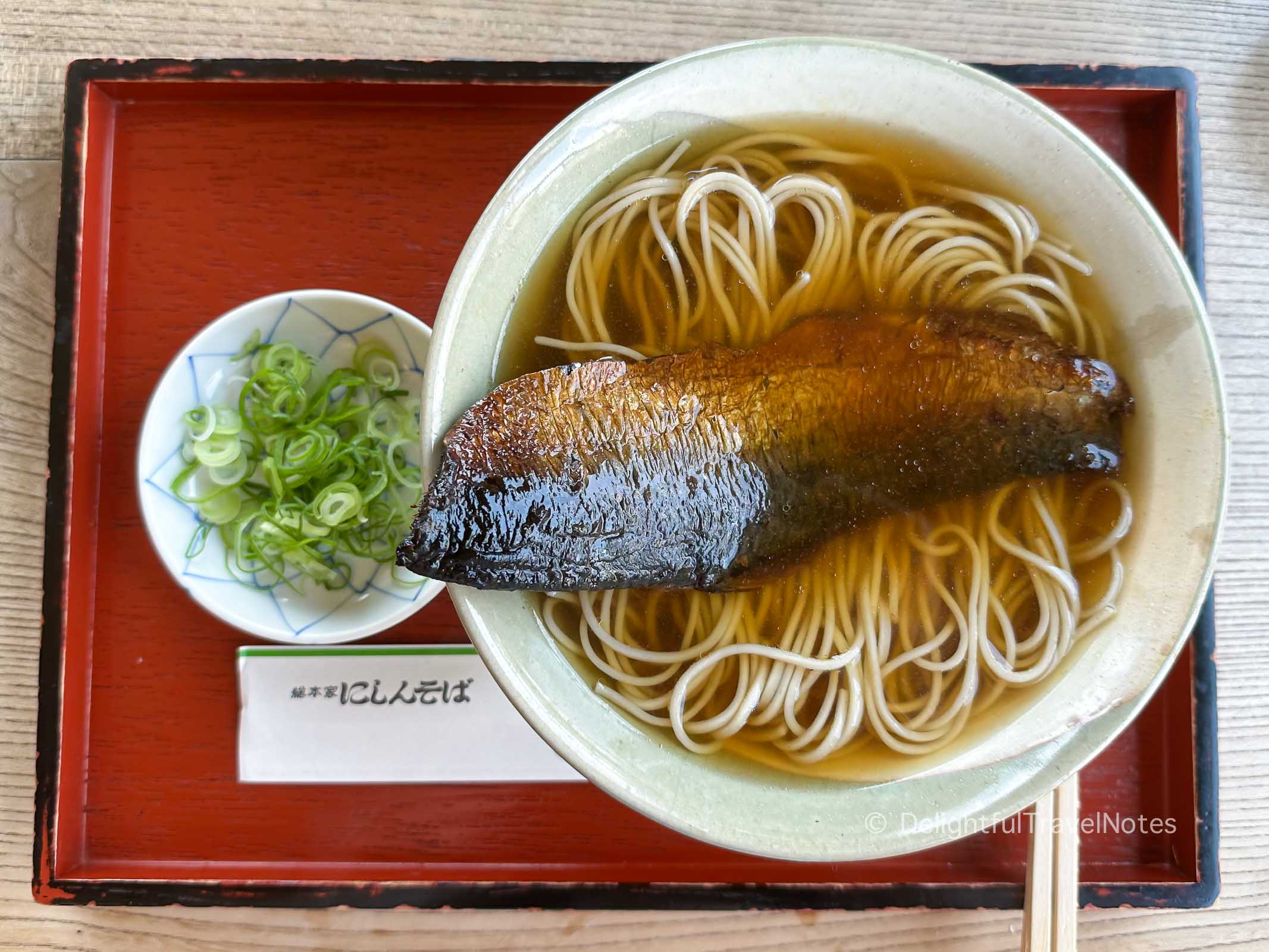 a bowl of nishin soba (herring soba) which is a must try Kyoto food at Matsuba restaurant.