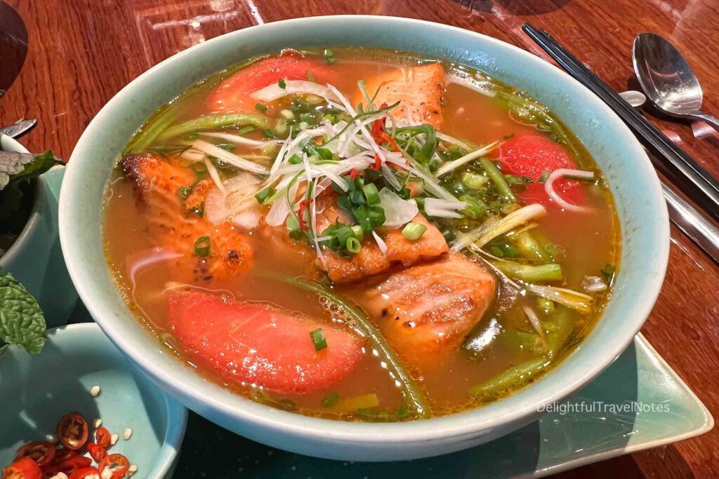 a bowl of salmon noodle soup at Vietnam House, one of the best Vietnamese restaurants in Ho Chi Minh city.