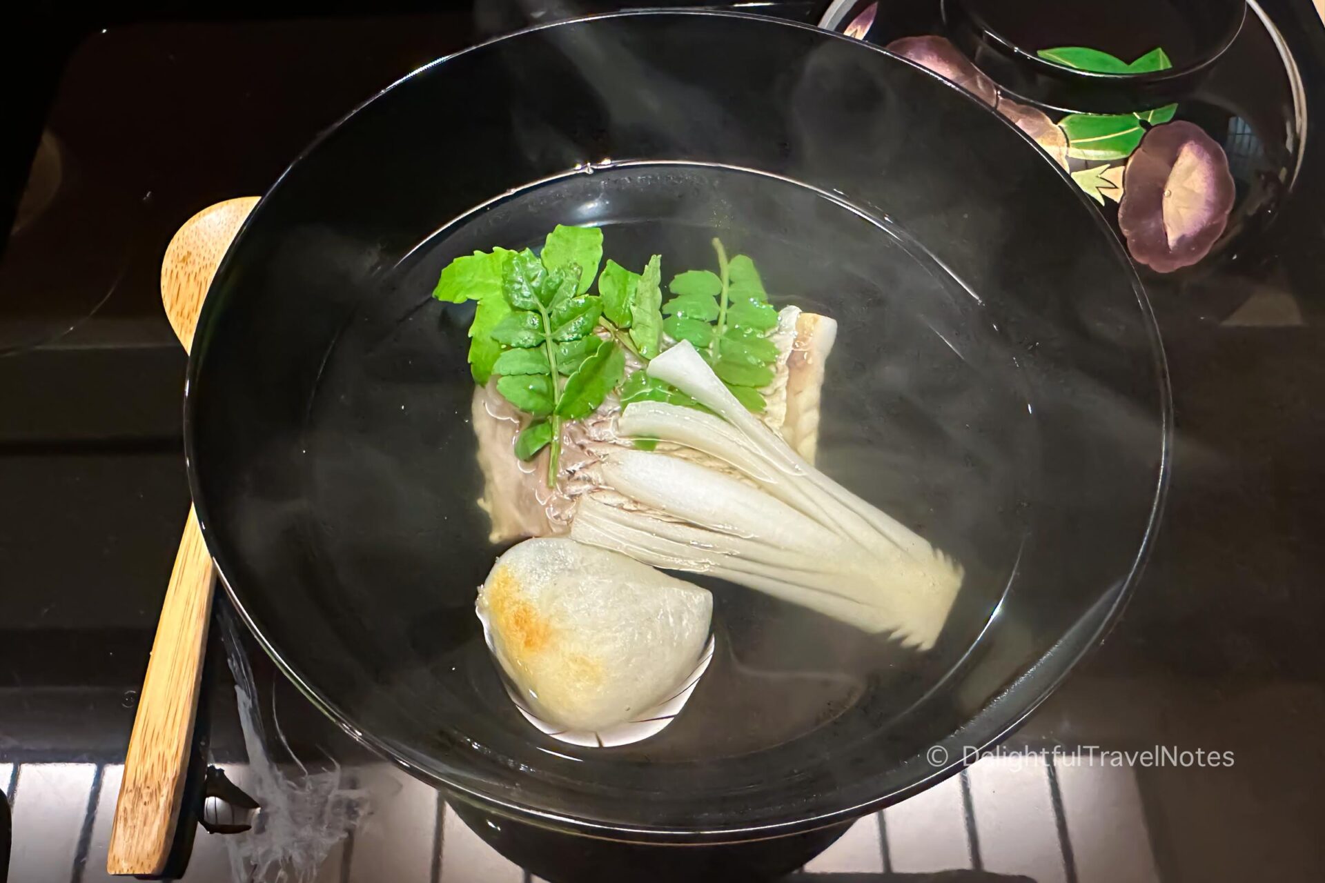 a bowl of suimono clear soup at Hassuna, a highly recommended restaurant in Kyoto.