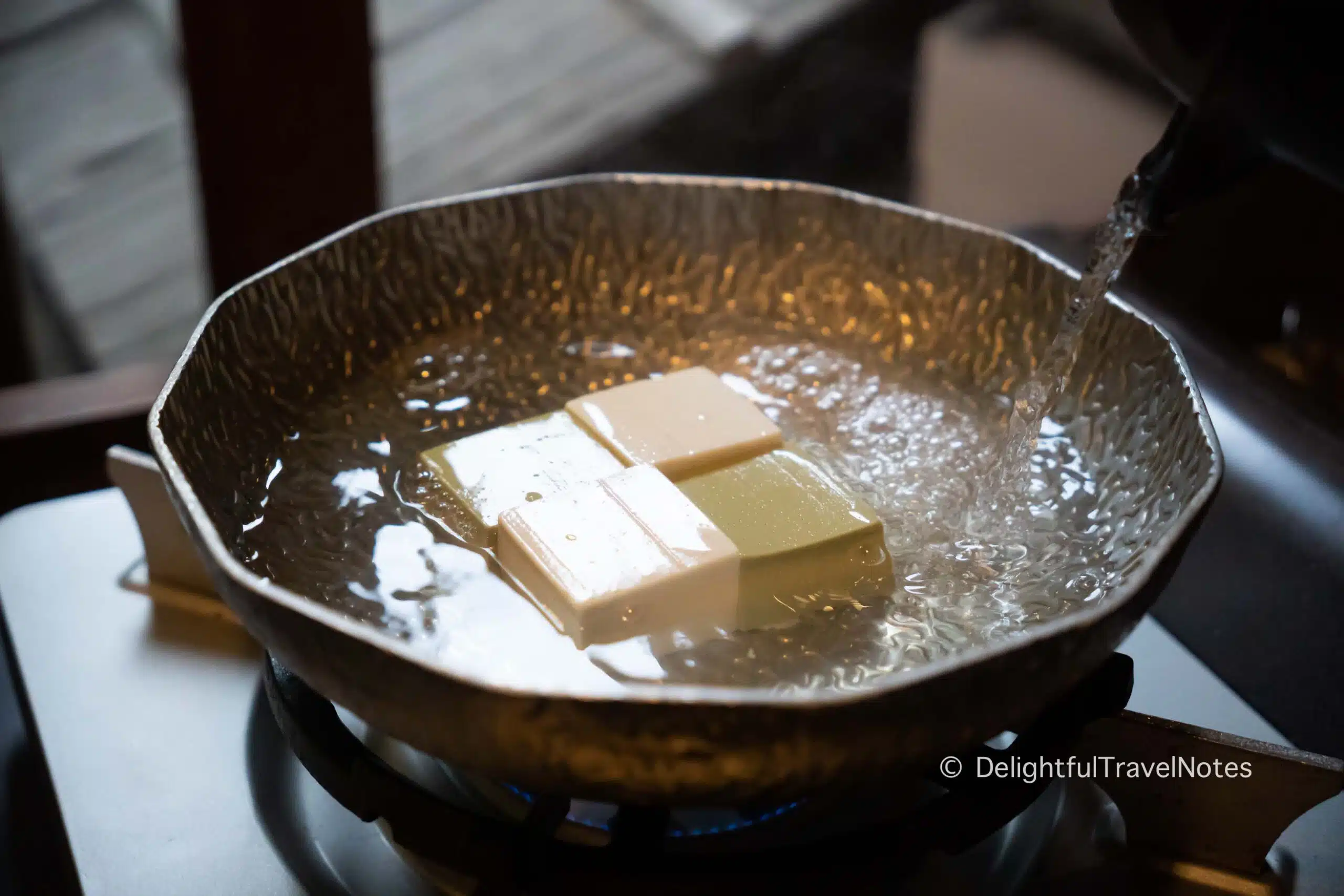 a pot of yudofu at Tofu Matsugae restaurant in Kyoto