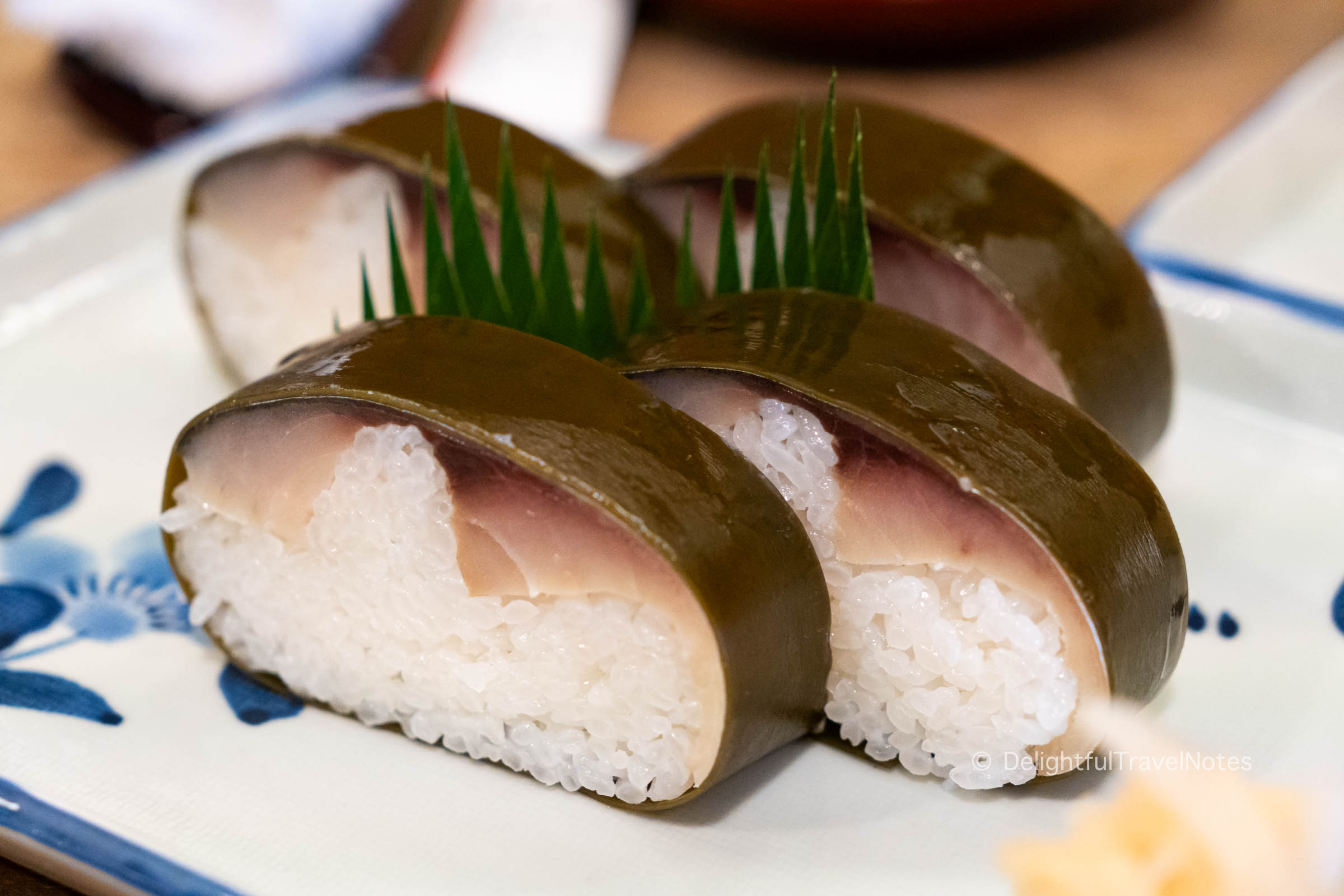 a plate of Kyoto traditional mackerel sushi at Izuu restaurant.