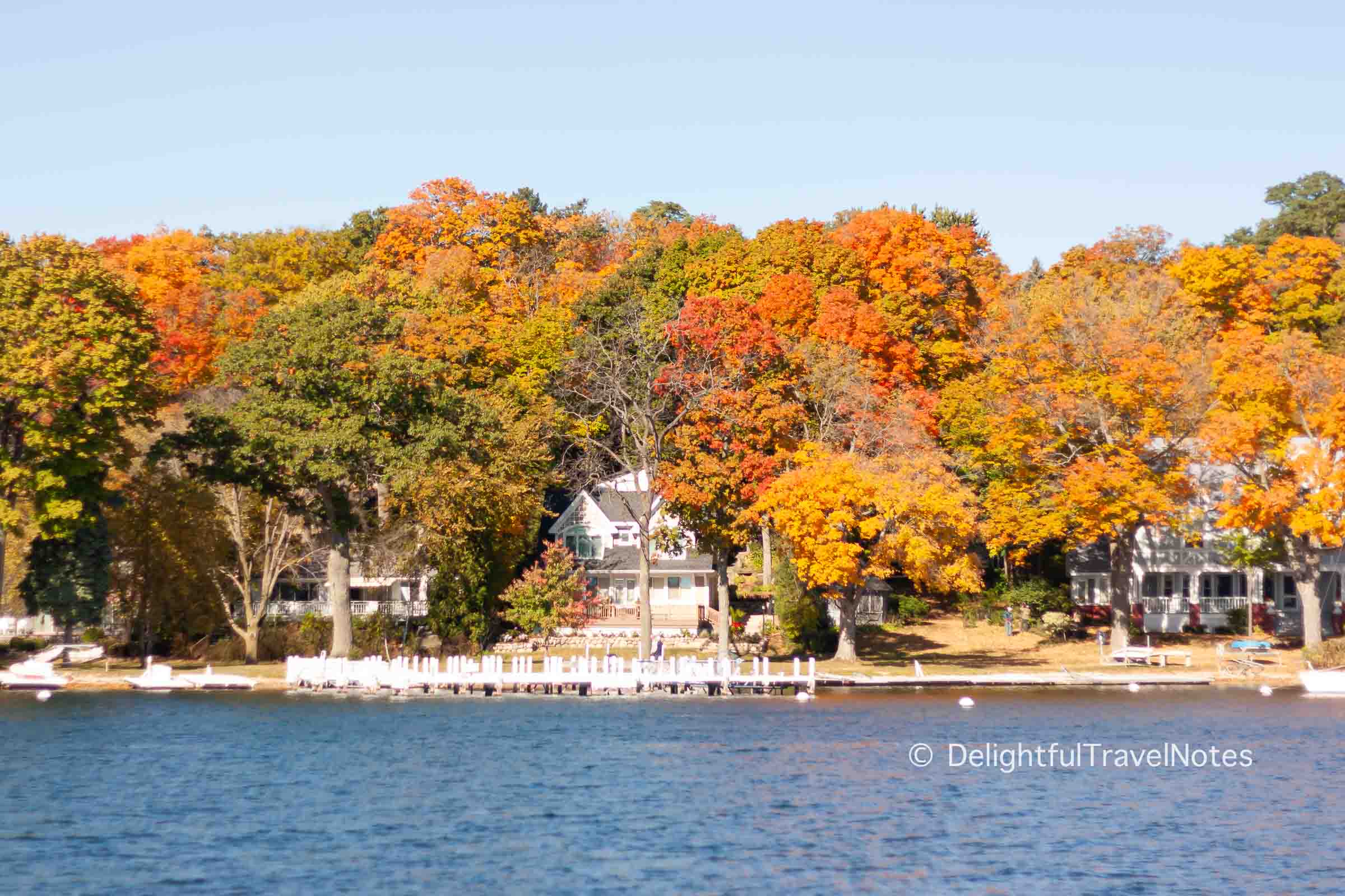 view of fall colors on Lake Geneva Cruise Line boat tour.