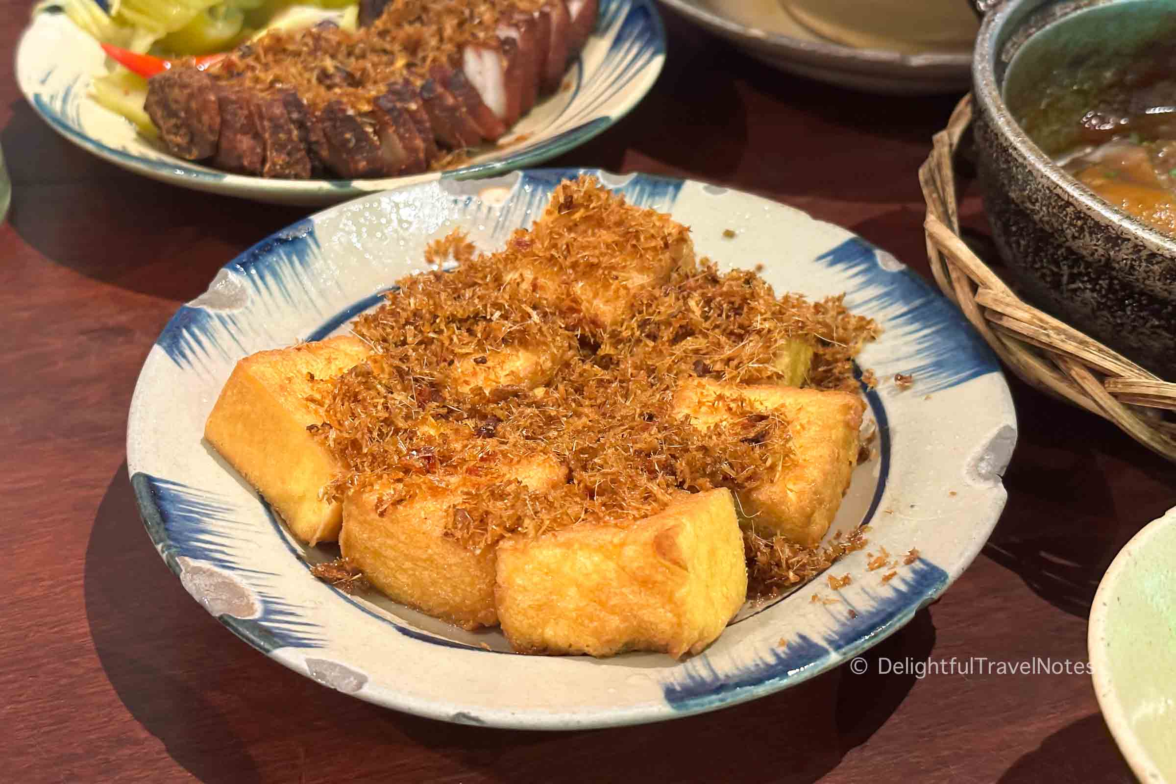 a plate of lemongrass chili tofu at Cuc Gach Quan restaurant in HCMC.