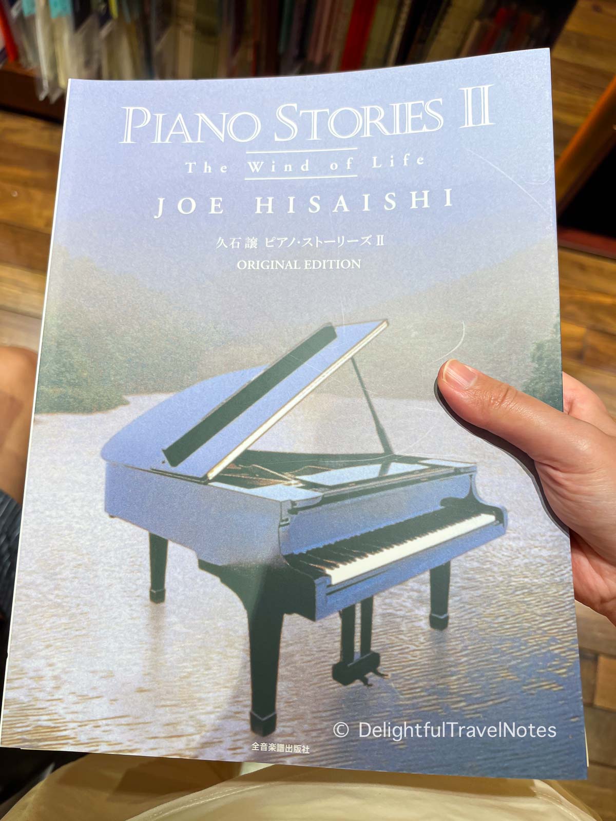Piano Stories II sheet music book by Joe Hisaishi.