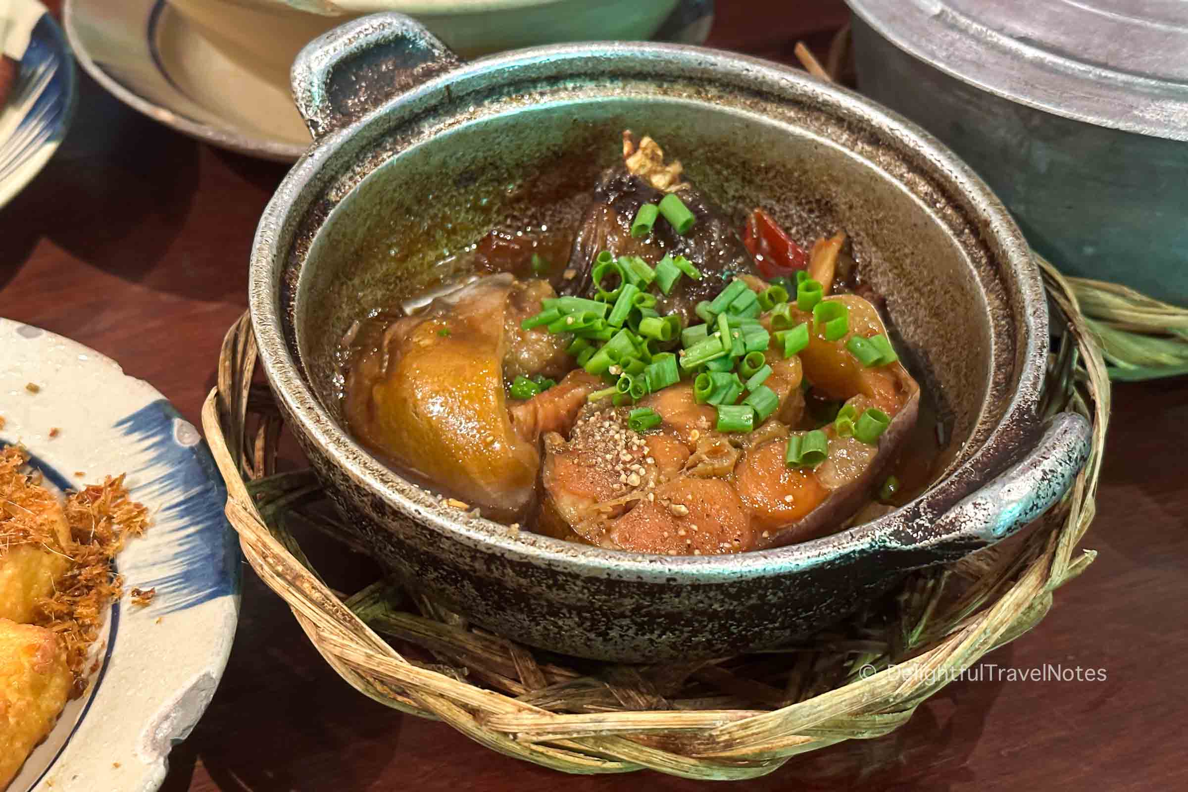 a bowl of Vietnamese caramelized fish at Cuc Gach Quan restaurant in Saigon.