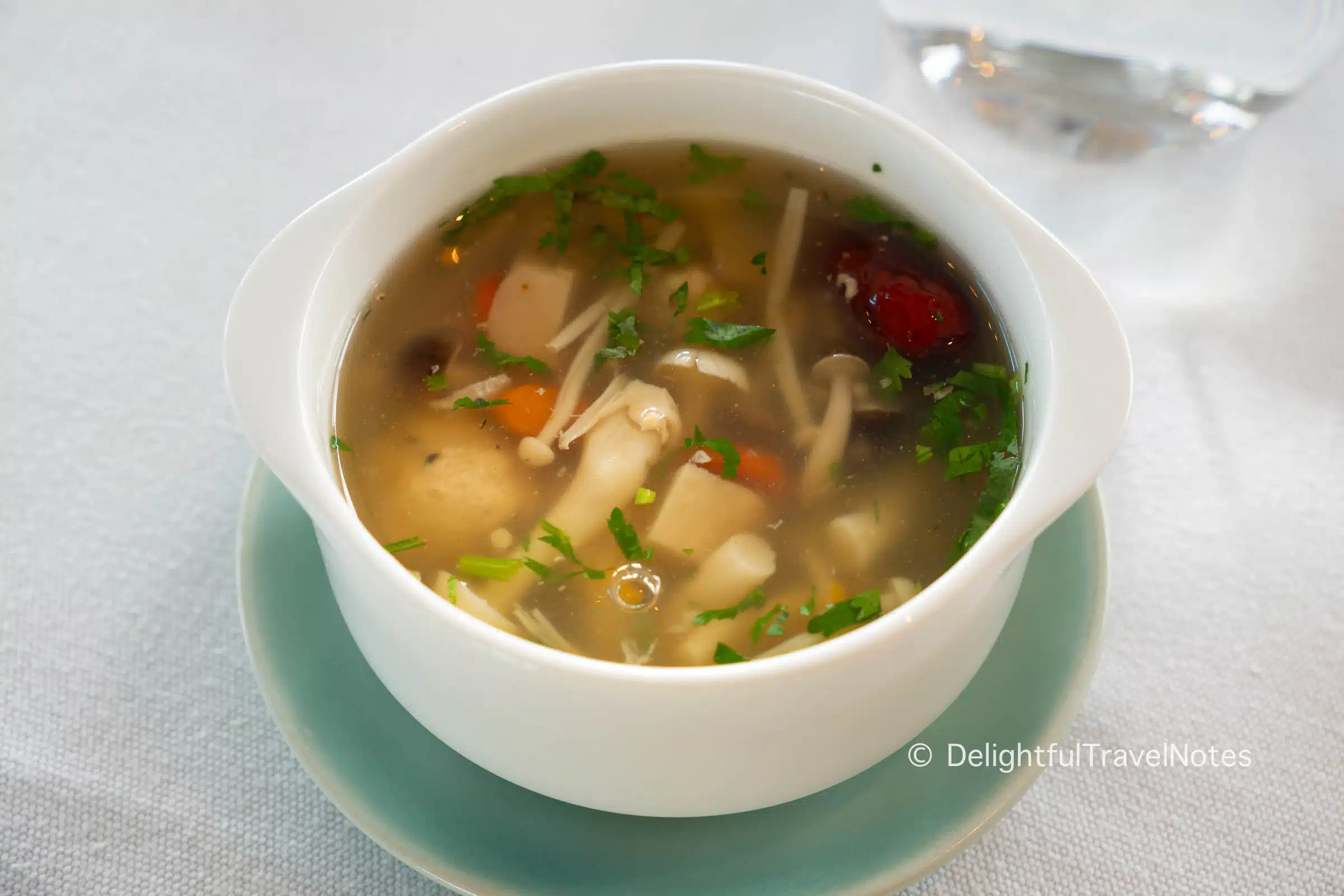 a bowl of chicken herbal soup served at lunch on Ginger Lan Ha Bay cruise.