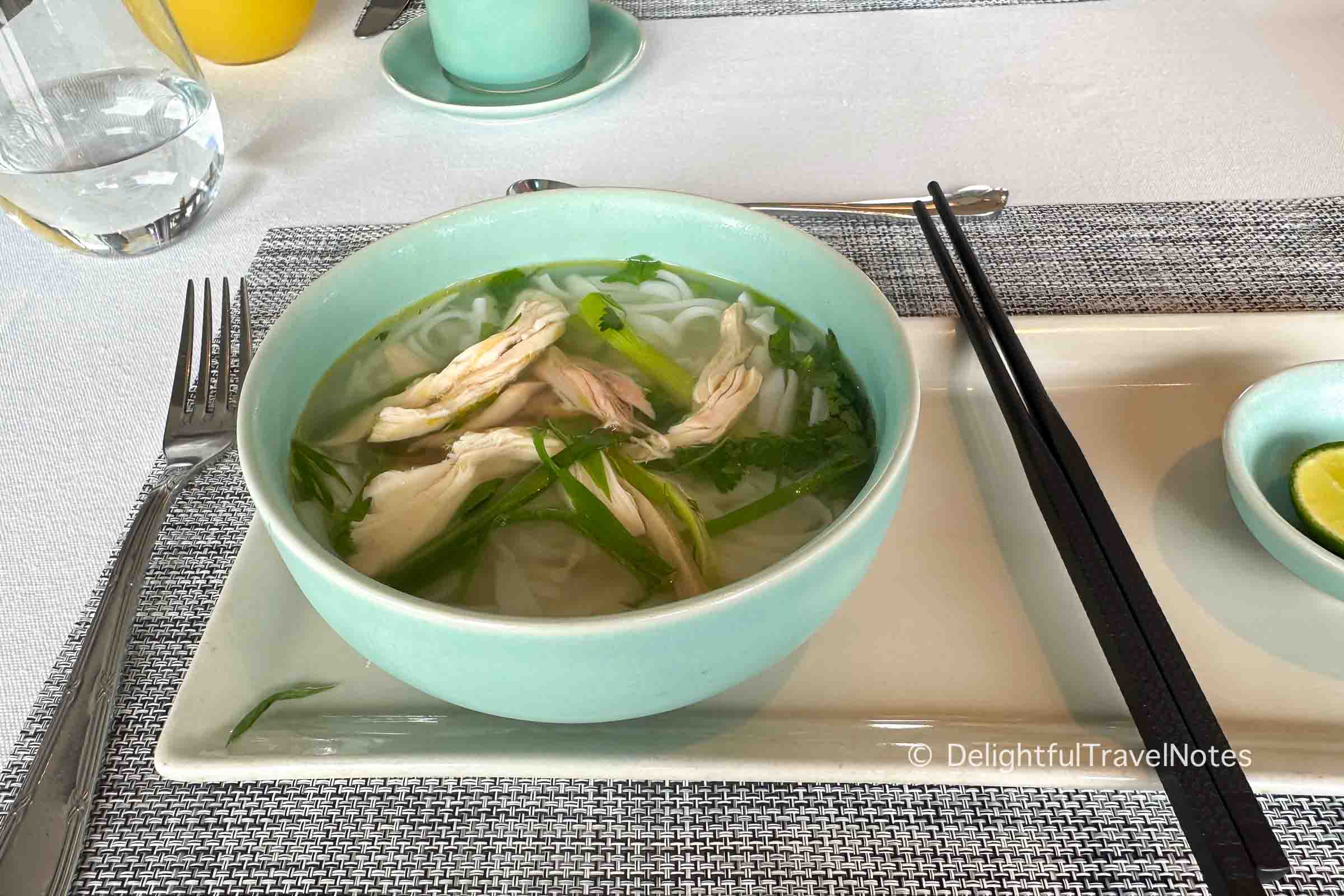 a bowl of chicken pho noodle soup on Ginger Lan Ha Bay cruise.