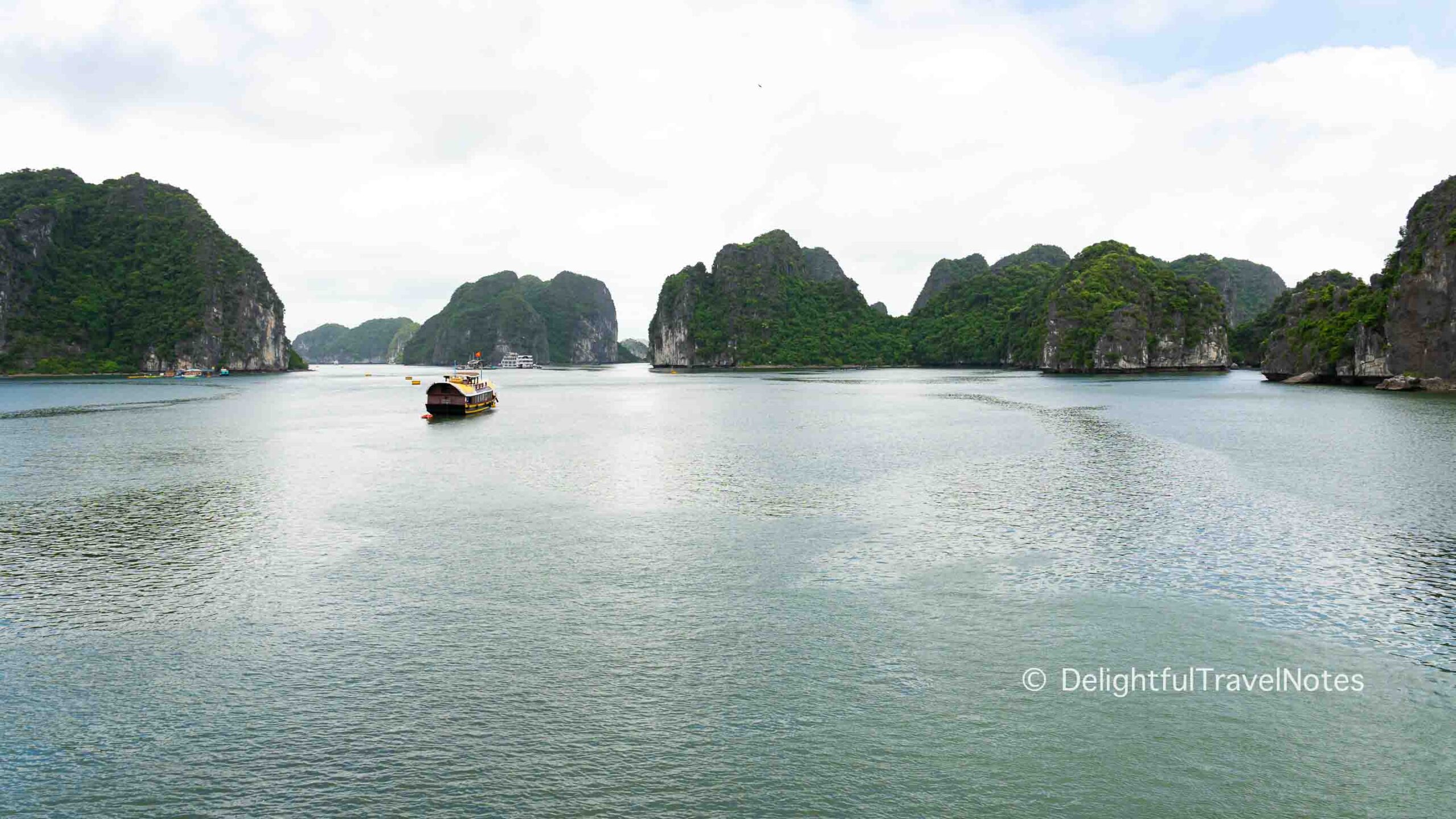 view of limestone islands over water in Lan Ha Bay.