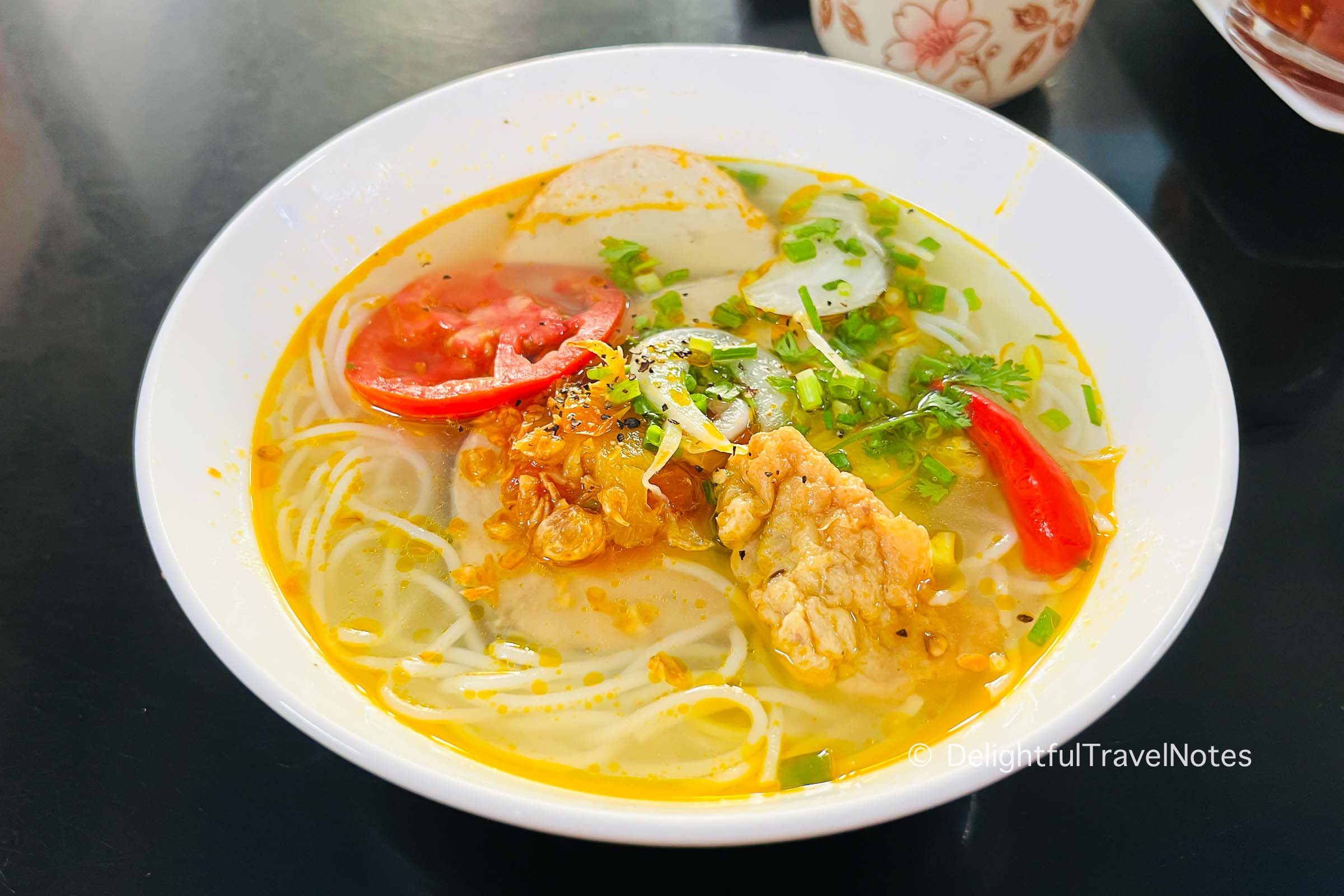 a bowl of fish cake noodle soup at Bun Cha Ca Ngoc Lien in Quy Nhon.
