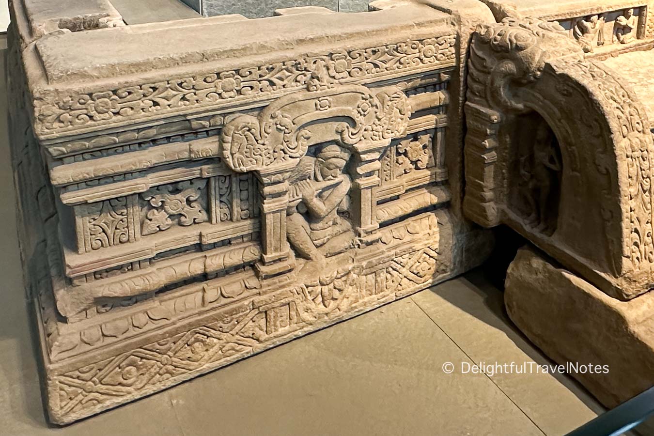 Carvings at the base of My Son temple E1 pedestal.