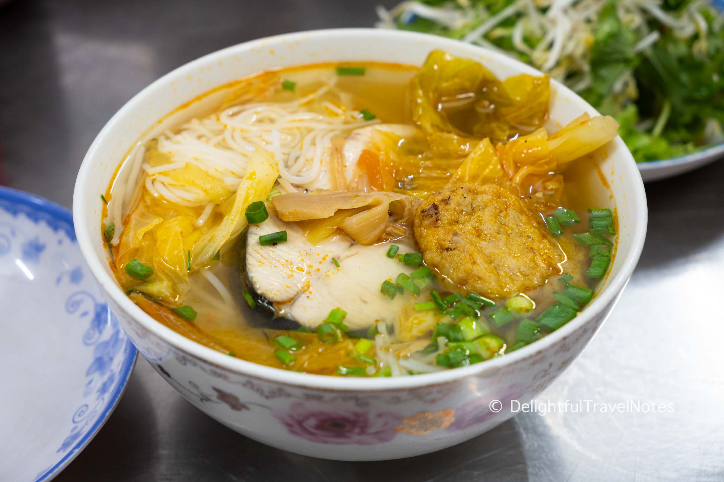 a bowl of fish cake noodle soup at Bun Cha Ca Hon in Da Nang, Vietnam.