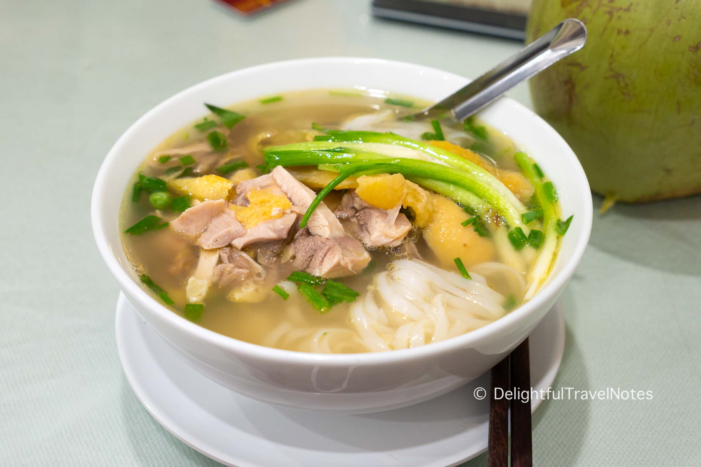 a bowl of Vietnamese chicken noodle soup at Huyen Huong, best pho ga place in Hanoi.