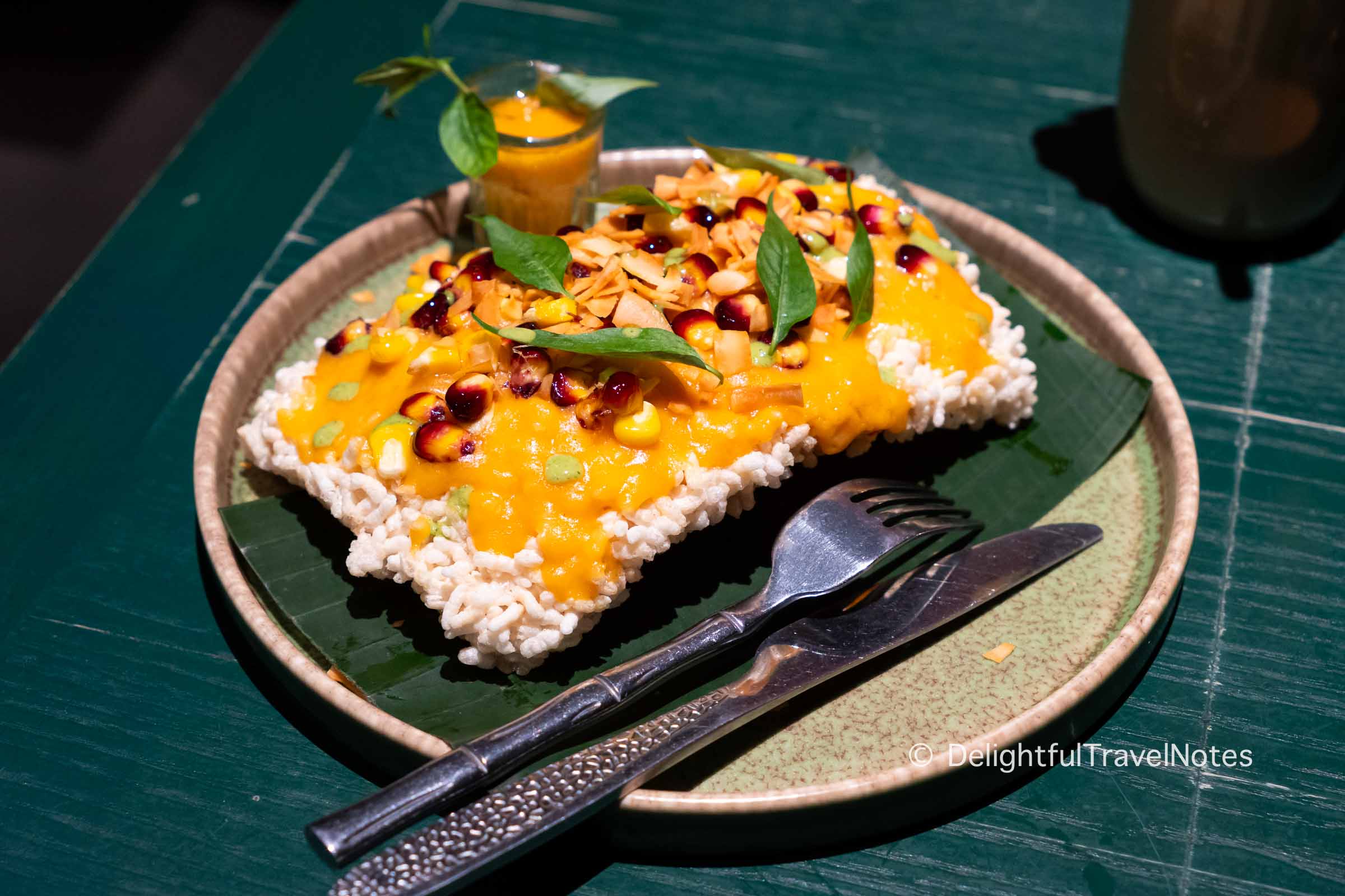 a plate of crispy rice at Uu Dam Chay restaurant in Hanoi.