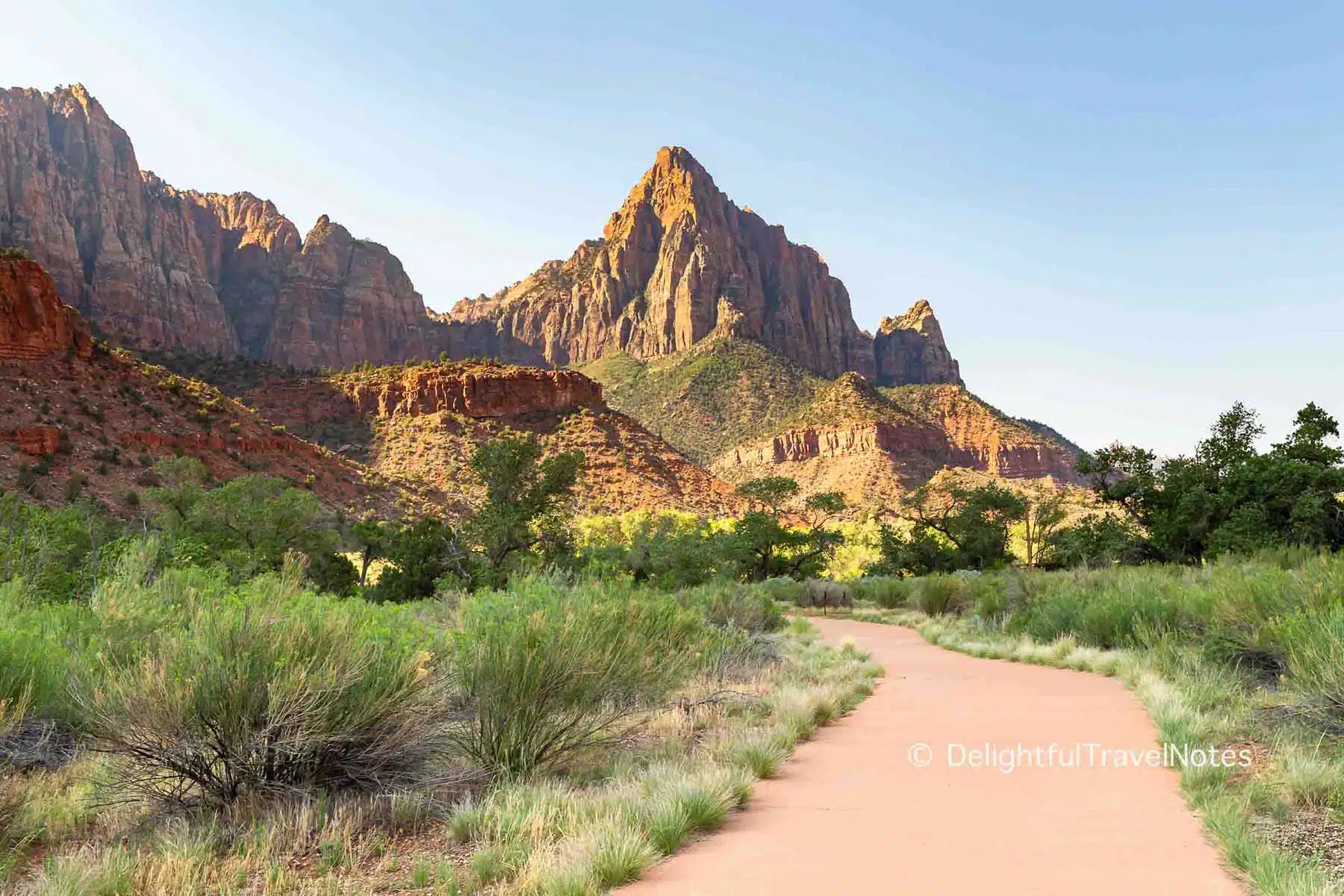 an empty path on Pa'rus trail late in the afternoon at Zion National Park.