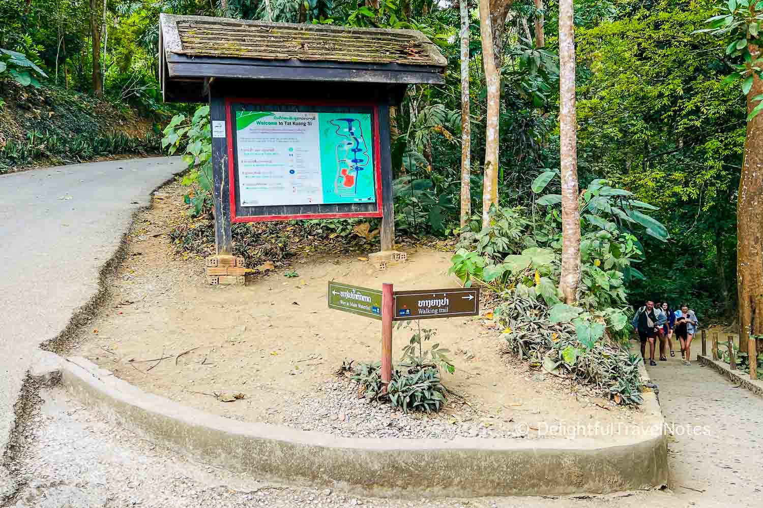 Signs showing paths to reach the Kuang Si waterfall.