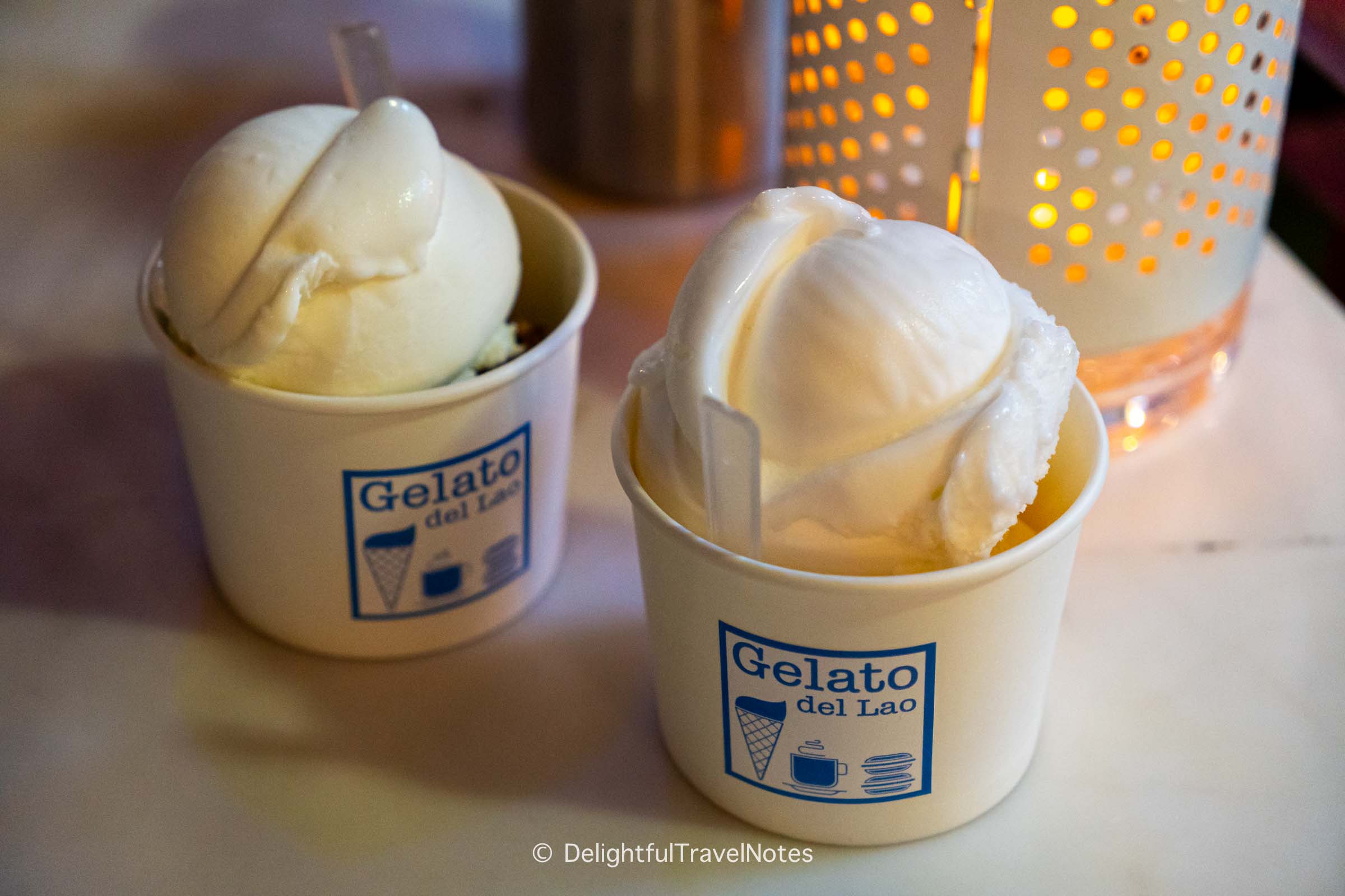 two cups with scoops of gelato and sorbets at Gelato del Lao in Luang Prabang.