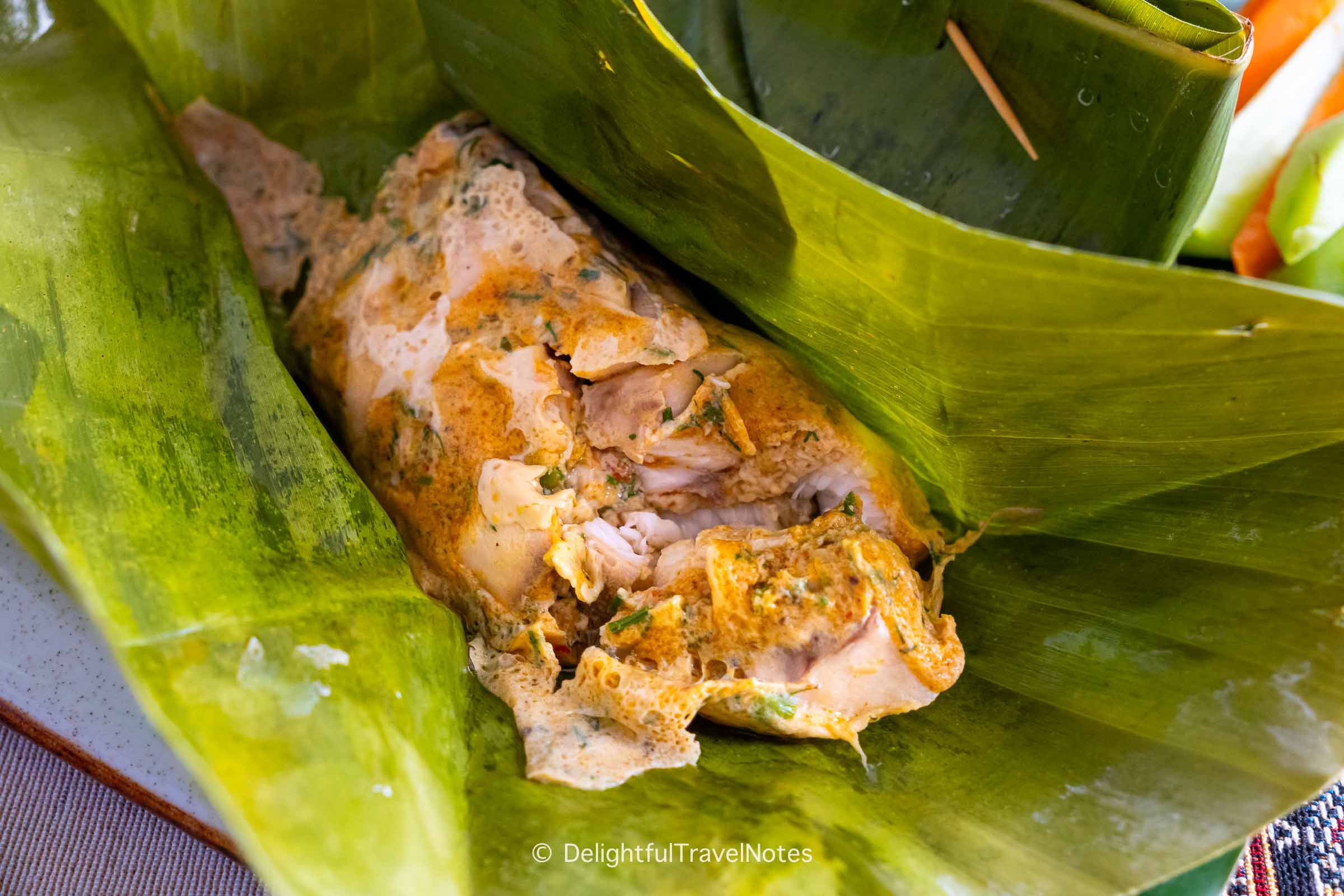 steamed fish in banana leaves at Cafe Toui, a must-eat place in Luang Prabang.