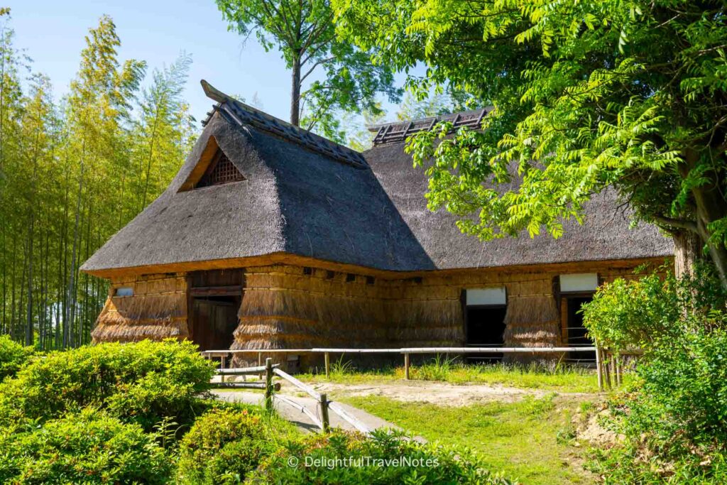 a farmhouse with thatched walls from Nagano at the Open Air Museum of Old Japanese Farm Houses in Osaka.