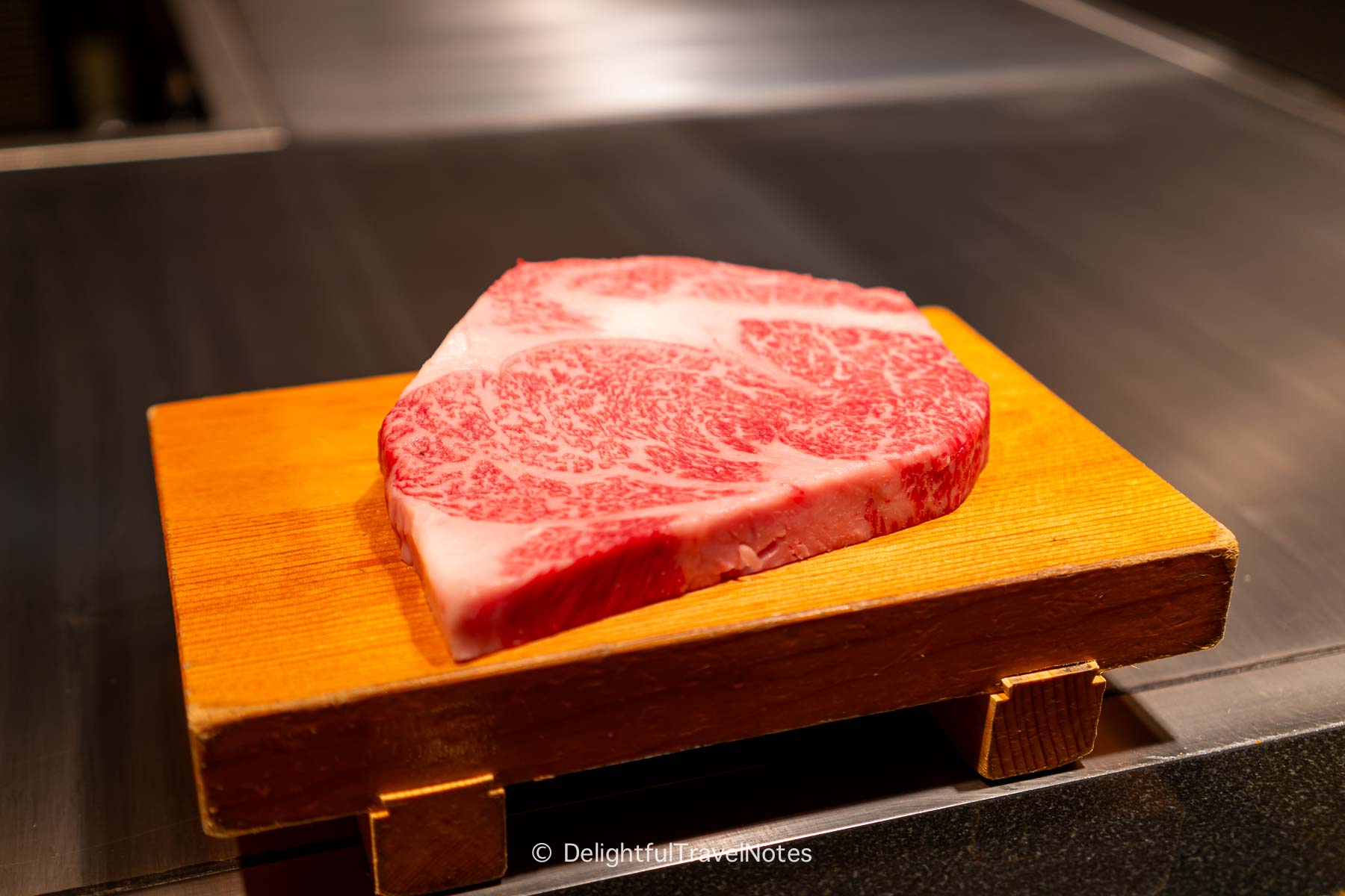 a thick cut of A5 sirloin wagyu at Beef Steak Ishida in Kobe.