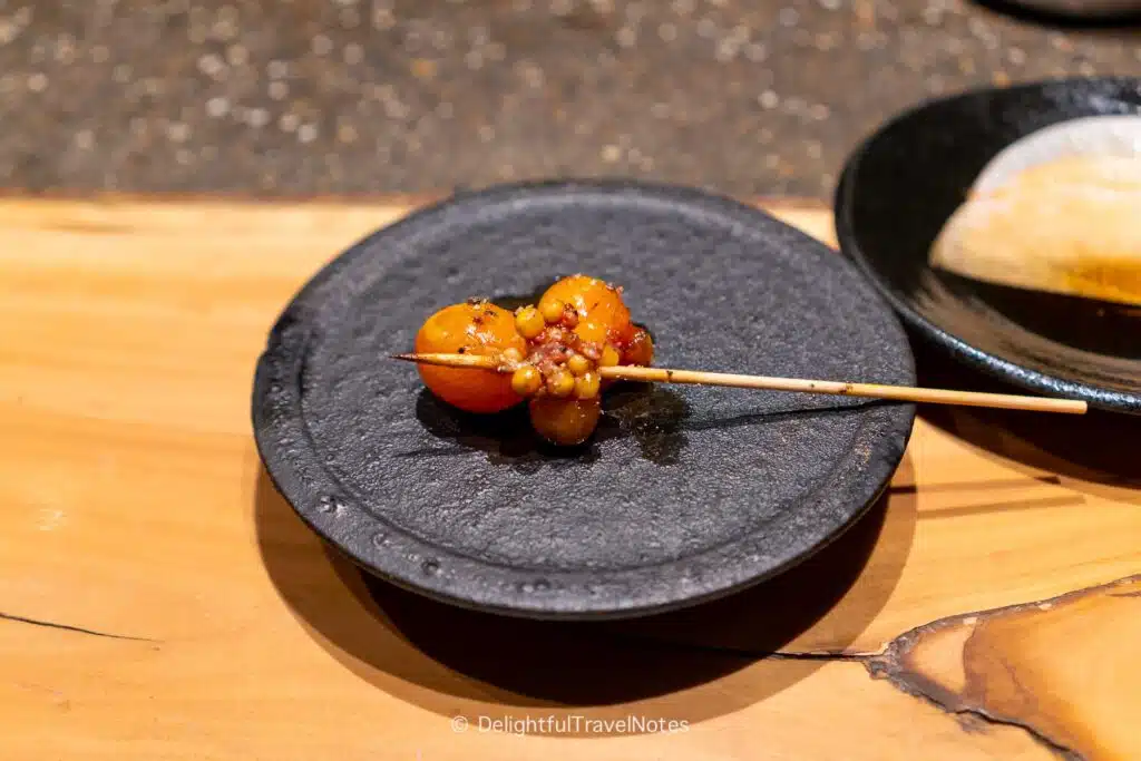 a yakitori skewer of chicken ovaries.