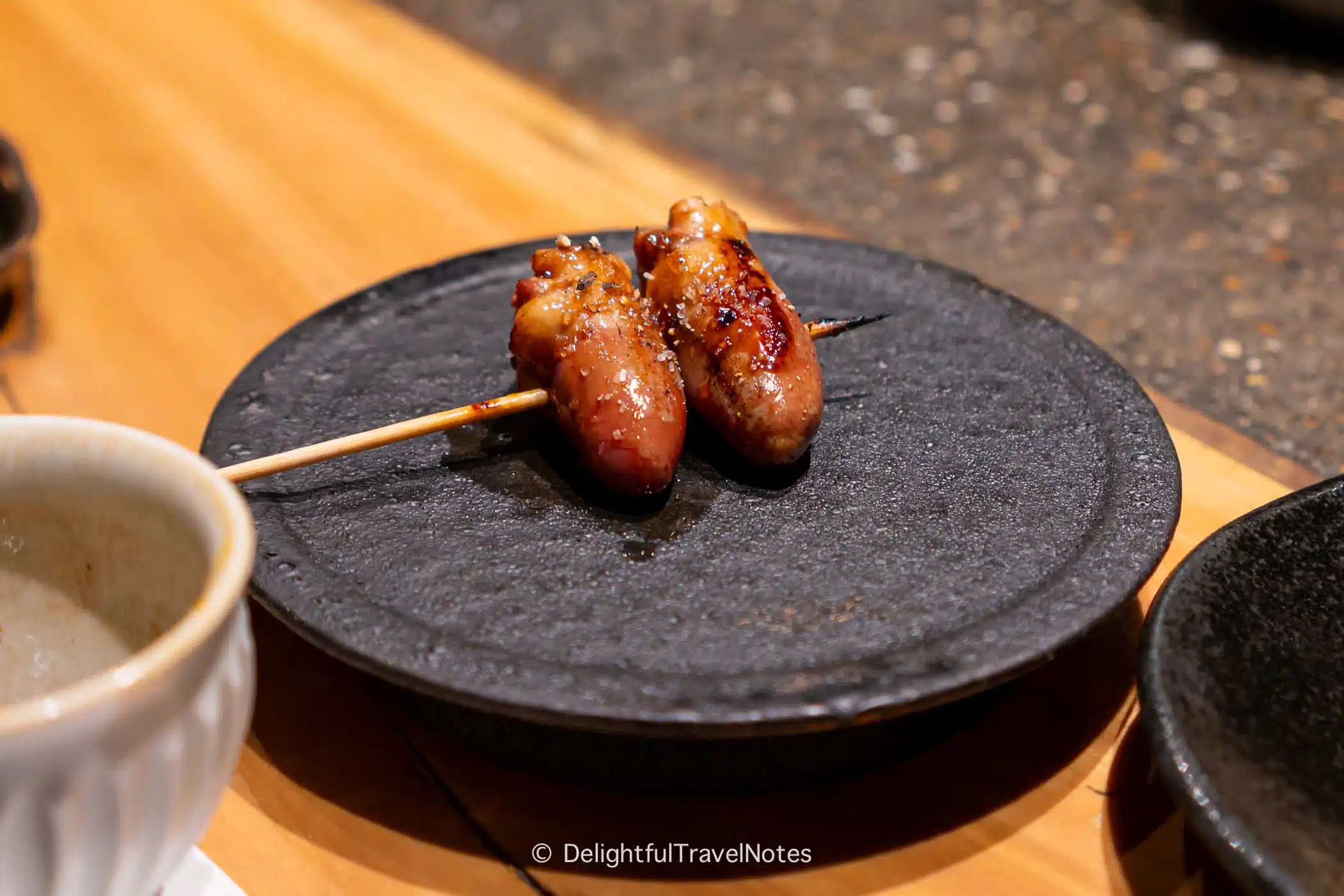 a grilled chicken heart skewers at Yakitori Matsuri in Osaka.