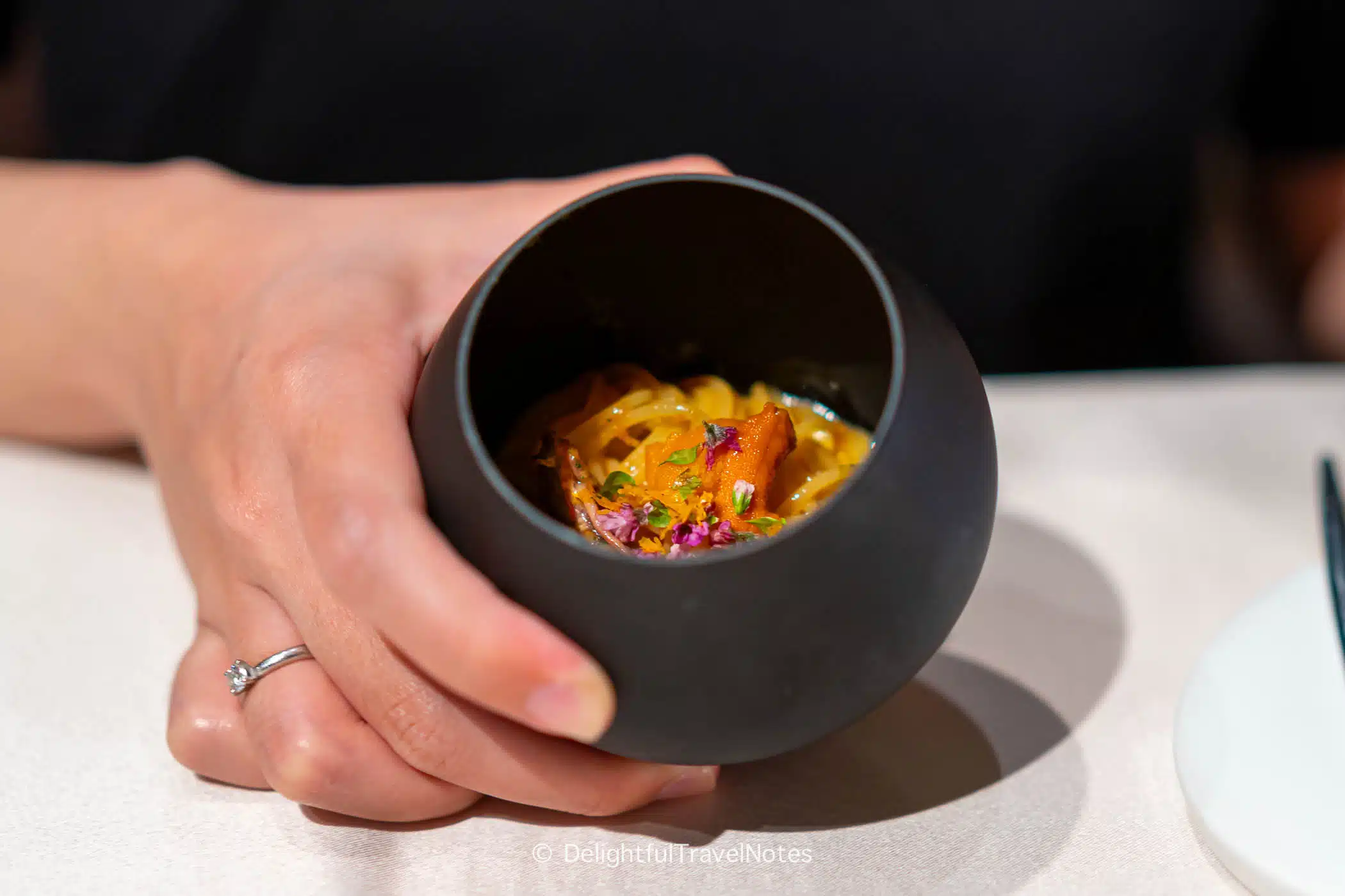 a bowl of pasta with uni and firefly squid at La Terrasse in Nara.