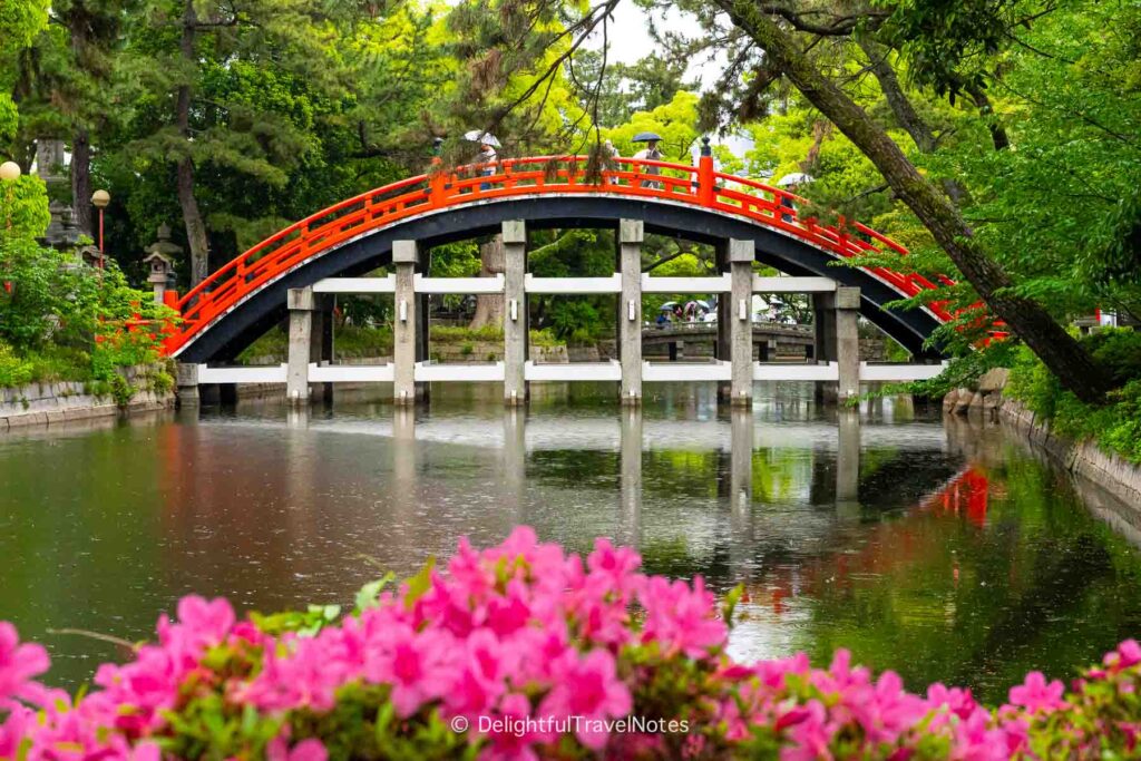 Sumiyoshi Taisha arched bridge (Sorihashi or Taiko-bashi) over the water.