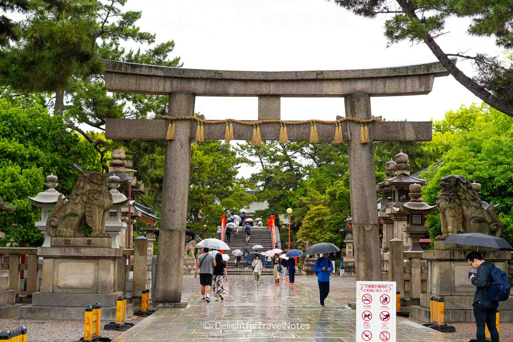 Stone torii gate marking the main entrance of Sumiyoshi Taisha in Osaka.