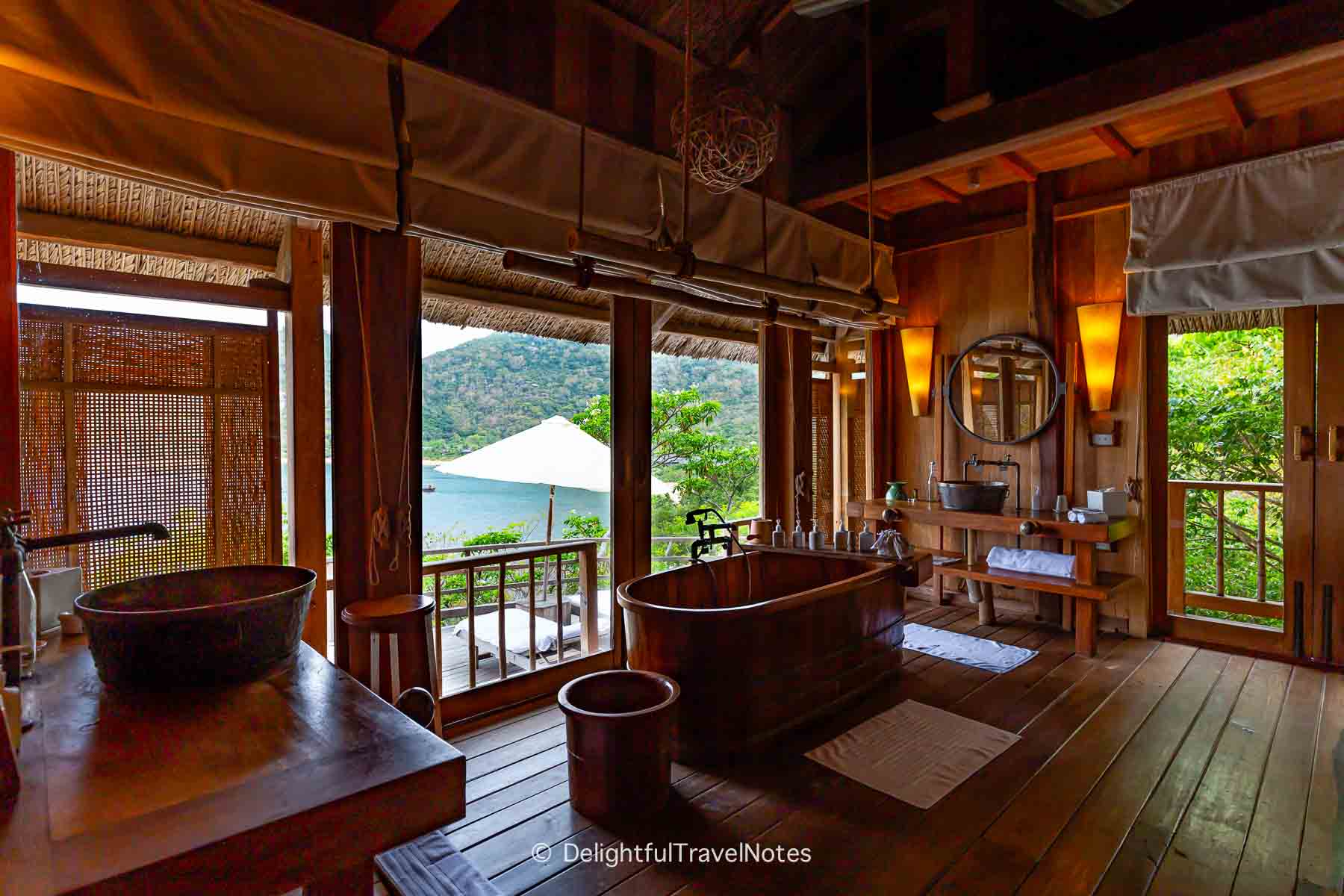 a spacious bathroom with ocean view at Six Senses Ninh Van Bay.