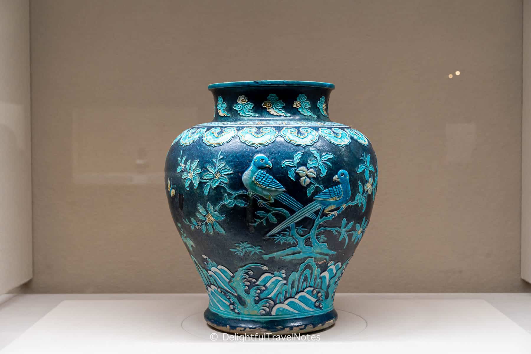 blue porcelain jar with intricate designs of birds and flowers at the Museum of Oriental Ceramics in Osaka.