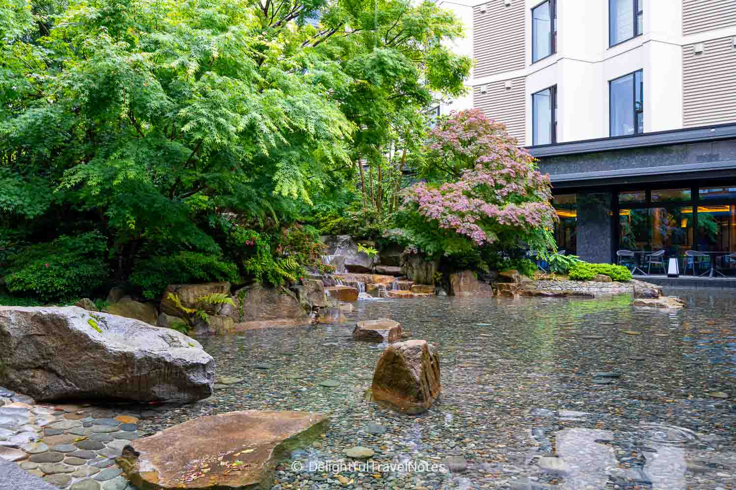 Lush courtyard Japanese garden in Hotel Sanraku Kanazawa.