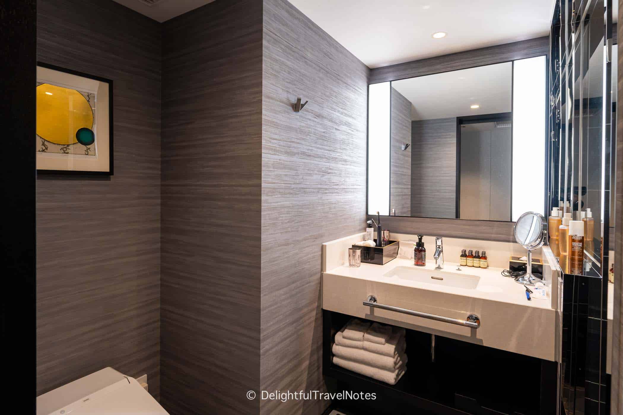 the bathroom vanity in guest room at Hotel Sanraku Kanazawa.