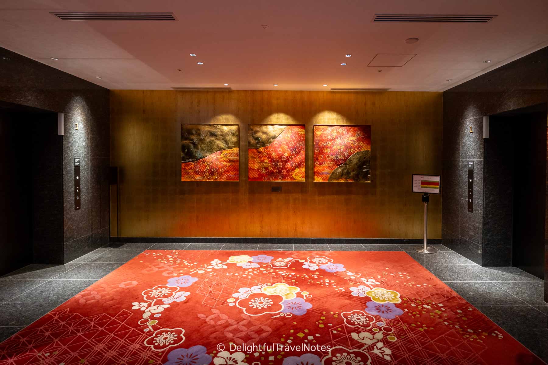 the elevator lobby of Hotel Sanraku Kanazawa, decorated in traditional Japanese aesthetics.