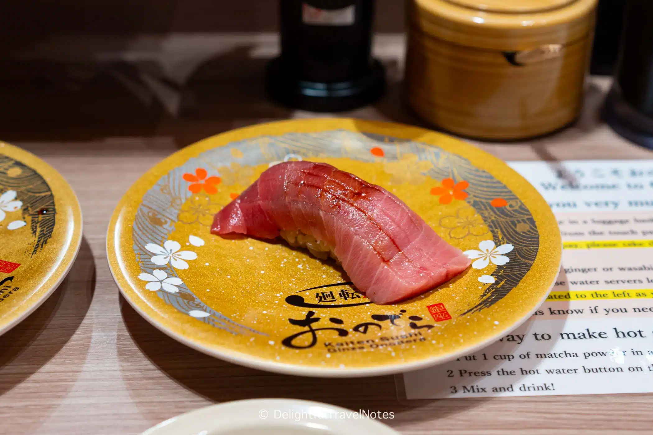 a plate of tuna toro nigiri at Kaiten Sushi Ginza Onodera, premium conveyor belt sushi in Japan.