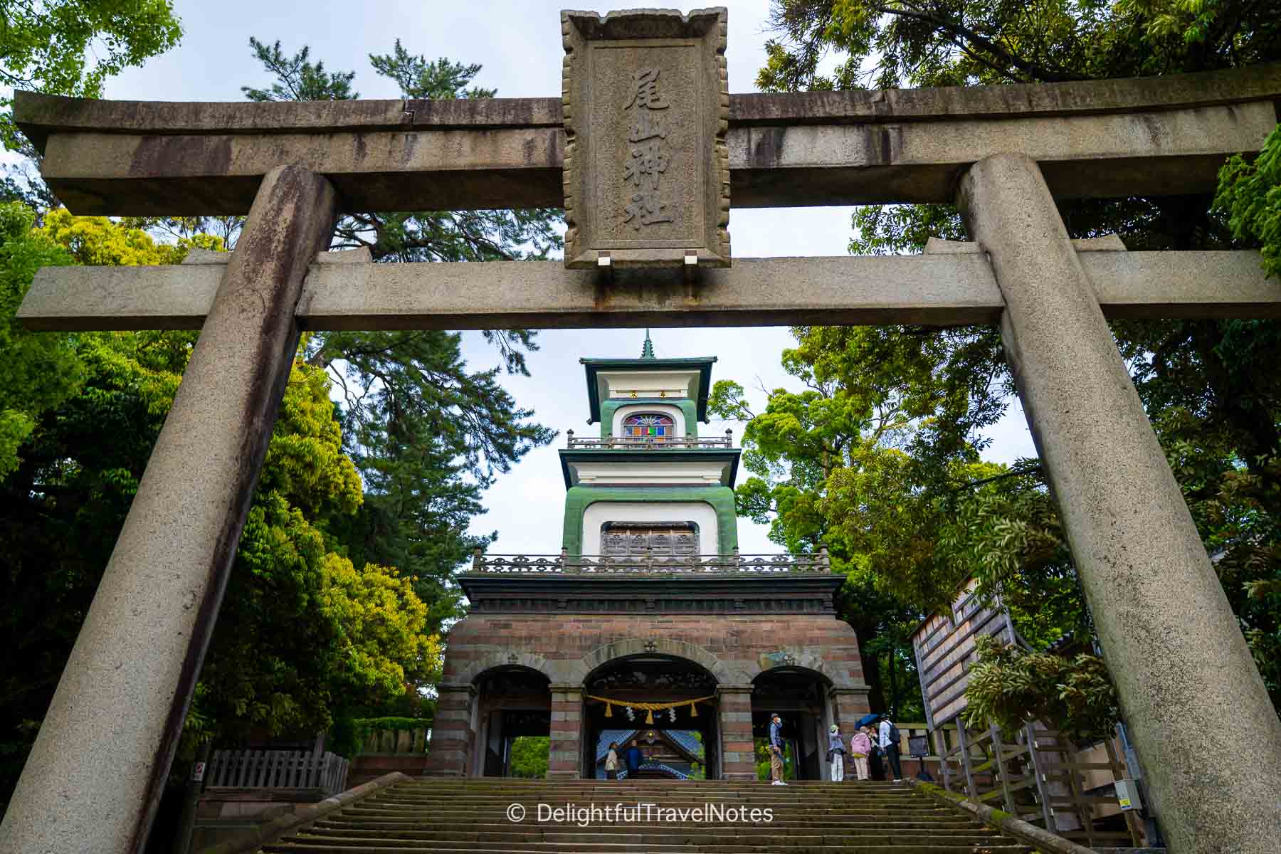 stone torii and main gate of Oyama Shrine in Kanazawa.