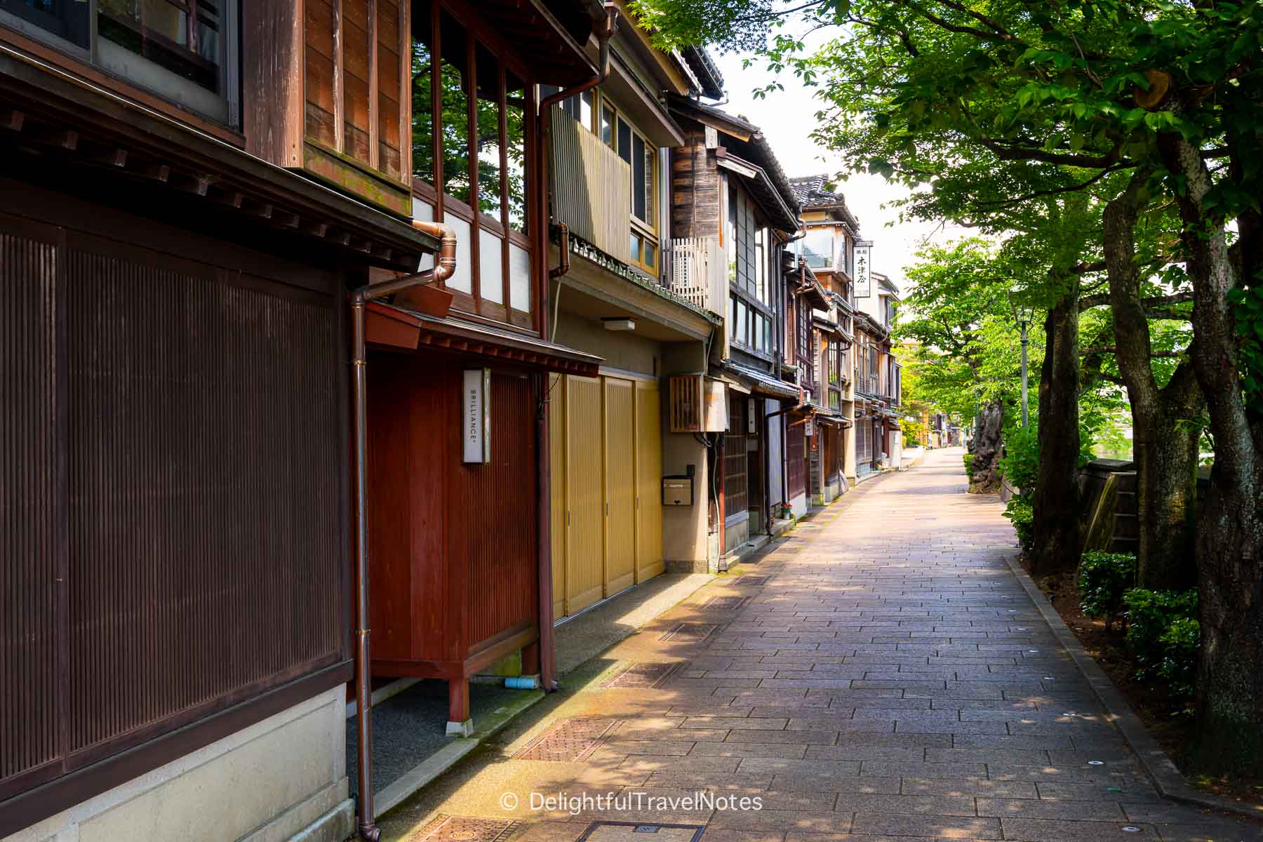 Wooden teahouses along riverbank in Kazuemachi Chaya District in Kanazawa.