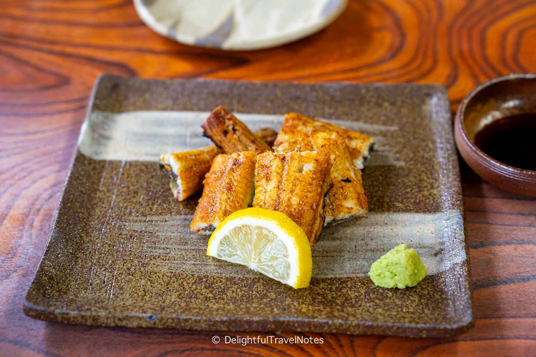 a plate of shirayaki white grilled eel at Warajiya restaurant in Kyoto.