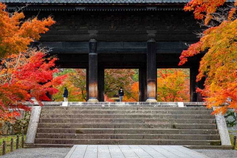 Closeup view of Nanzen-ji Sanmon Gate with stunning fall colors.