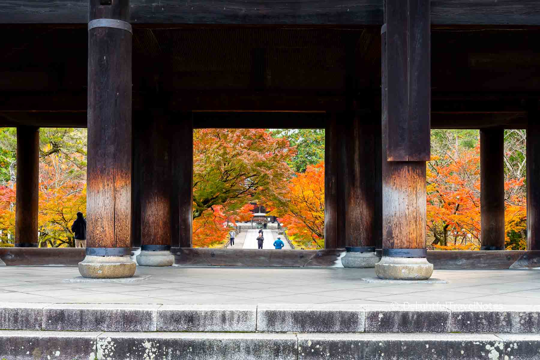 Fiery maples in the background of Nanzen-ji Sanmon Gate.