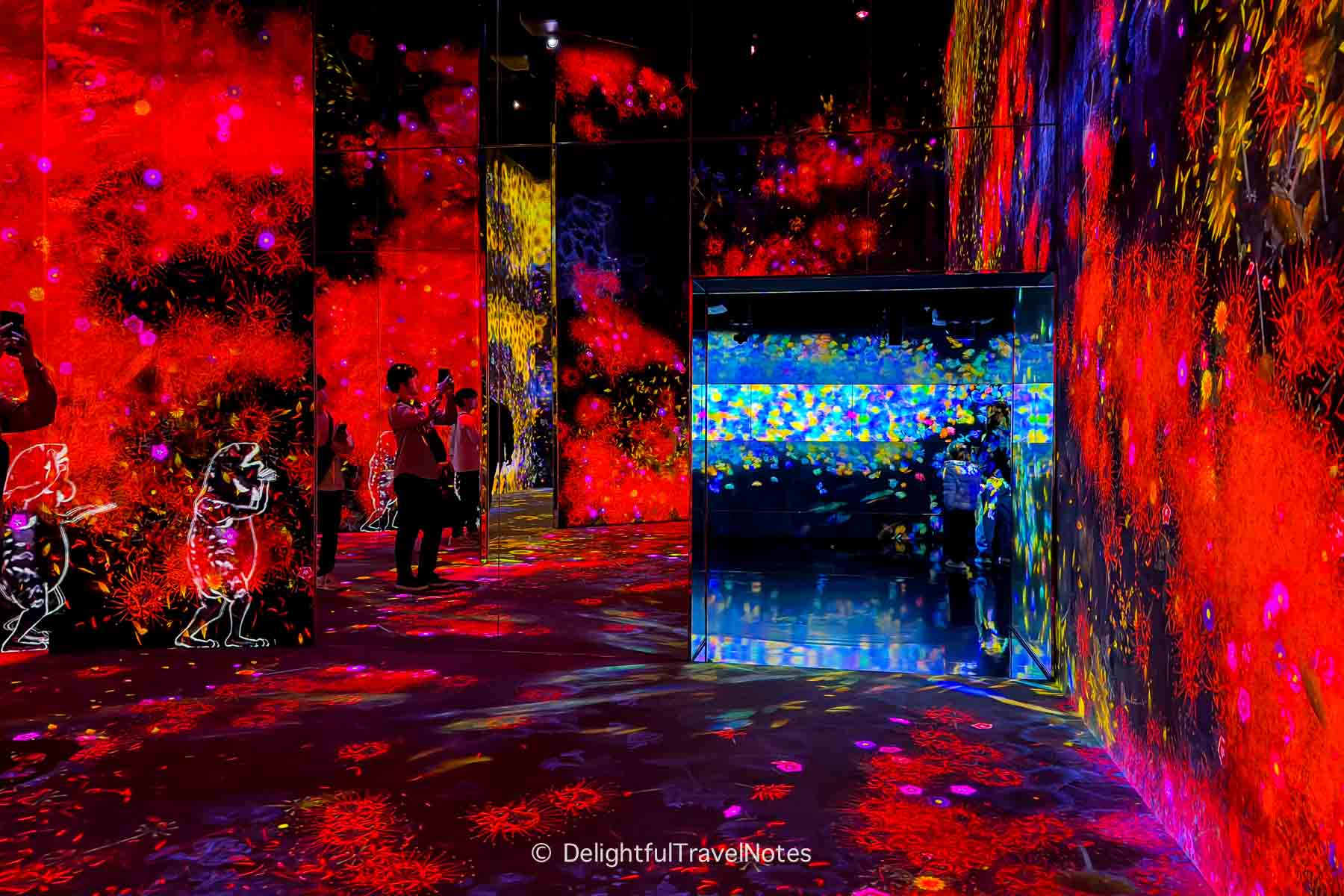 A room with vivid red patterns at TeamLab Borderless in Tokyo.