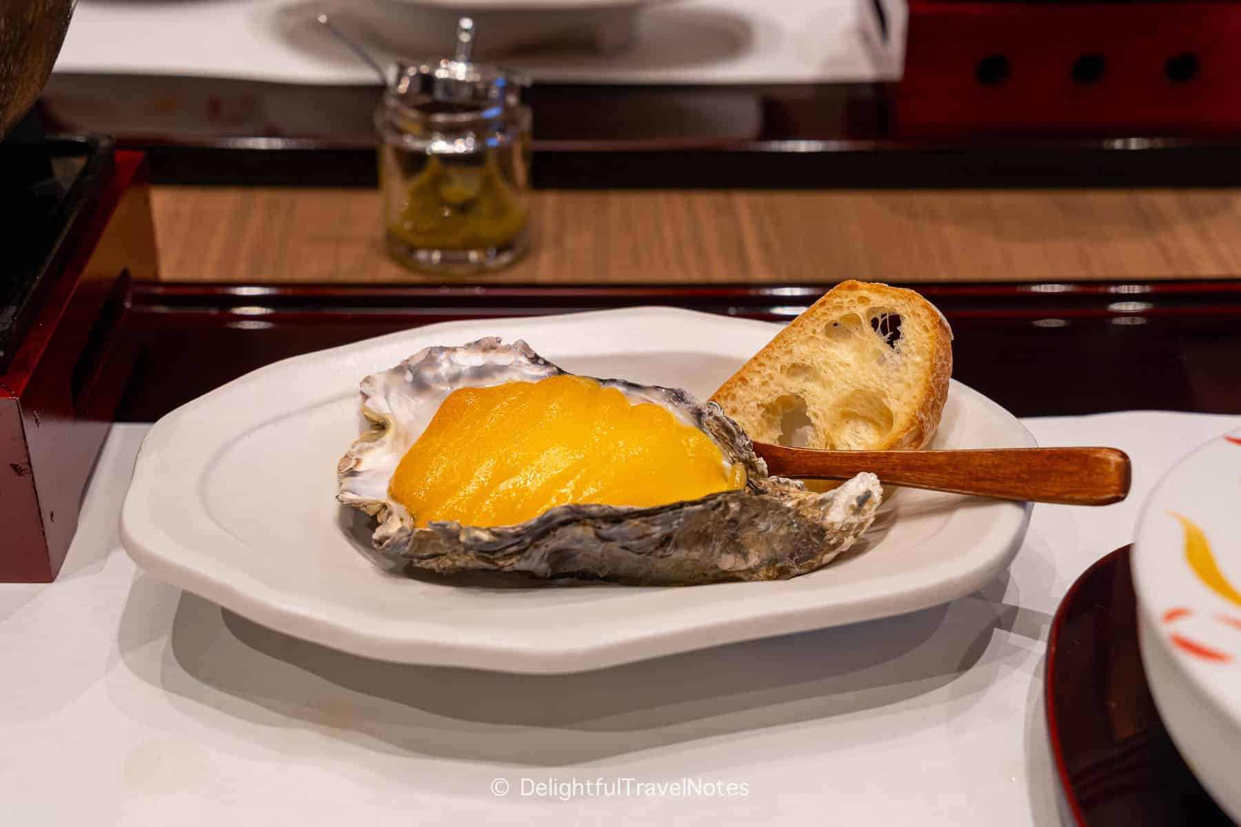 a plate of Oyster miso gratin in the kaiseki dinner at Kinsuikan Miyajima