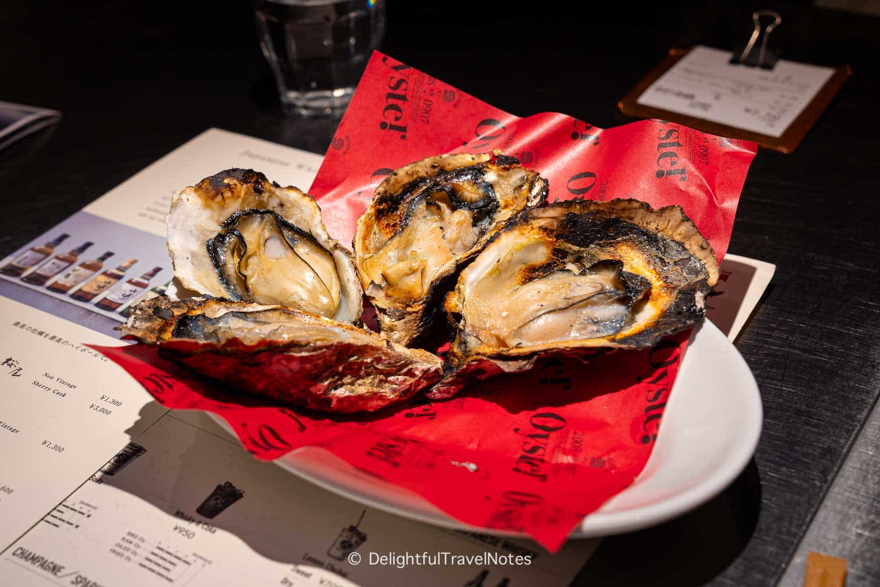 a plate of grilled local oysters.